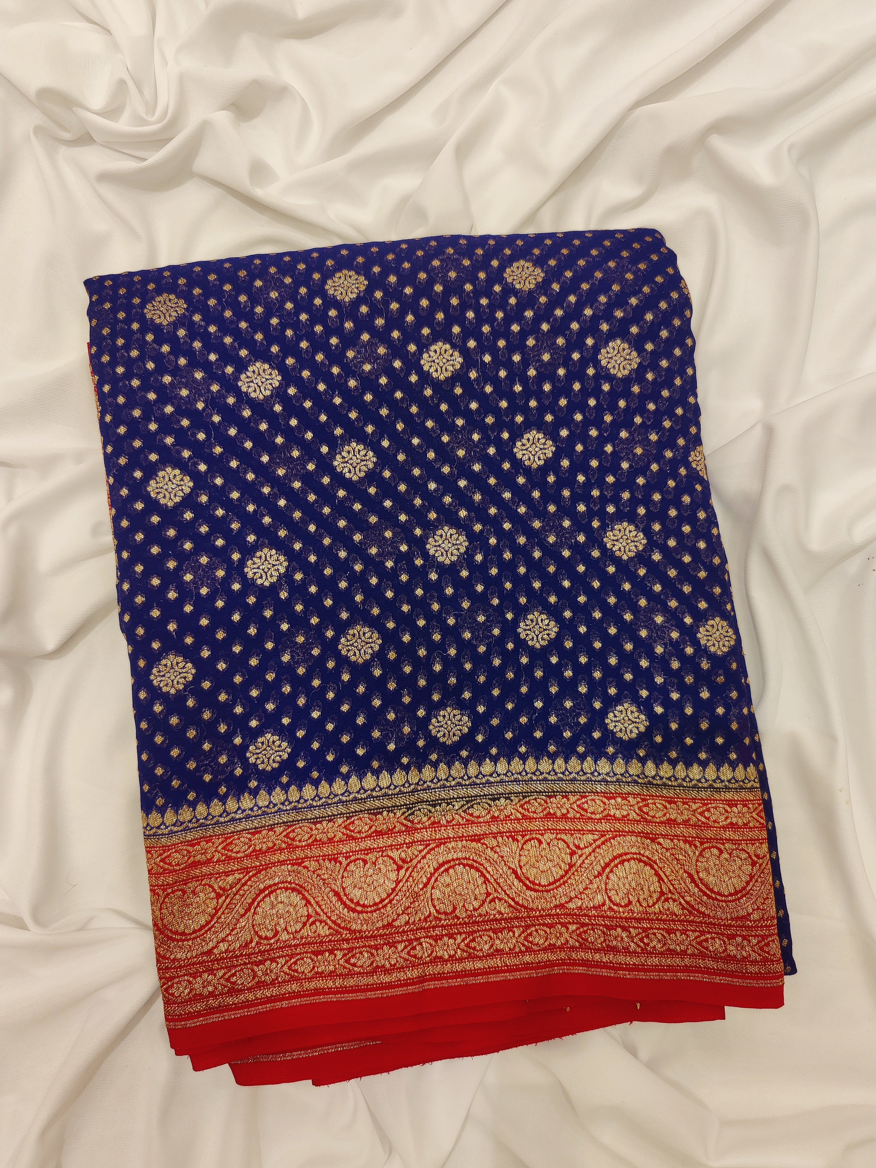 Navy Blue Pure Georgette Silk Saree with Red Zari Accents – Elegant Traditional Saree for Weddings Online - New Sudarshan Silks`