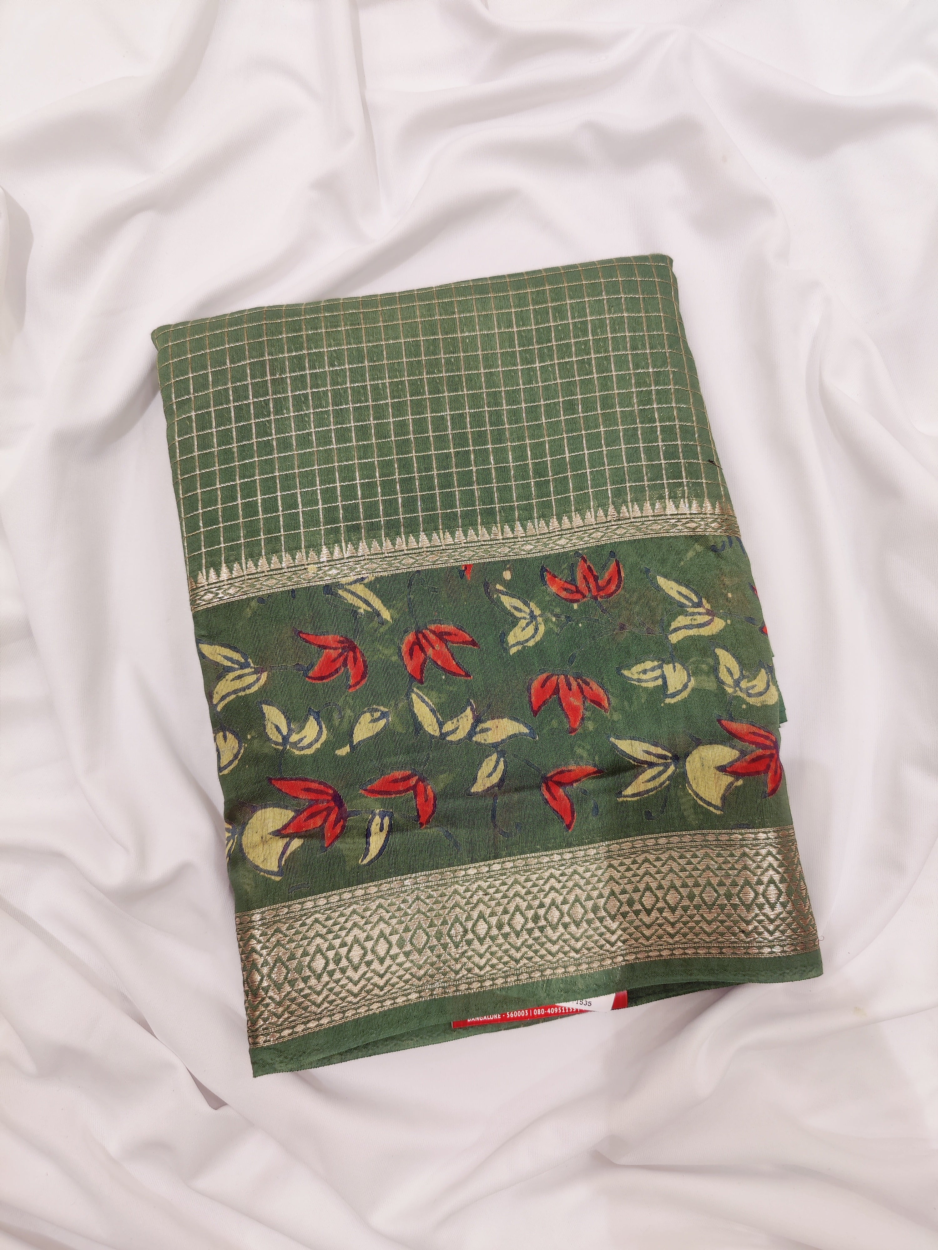 Green Saree with Designer Floral Border – Where Elegance Meets Artistry