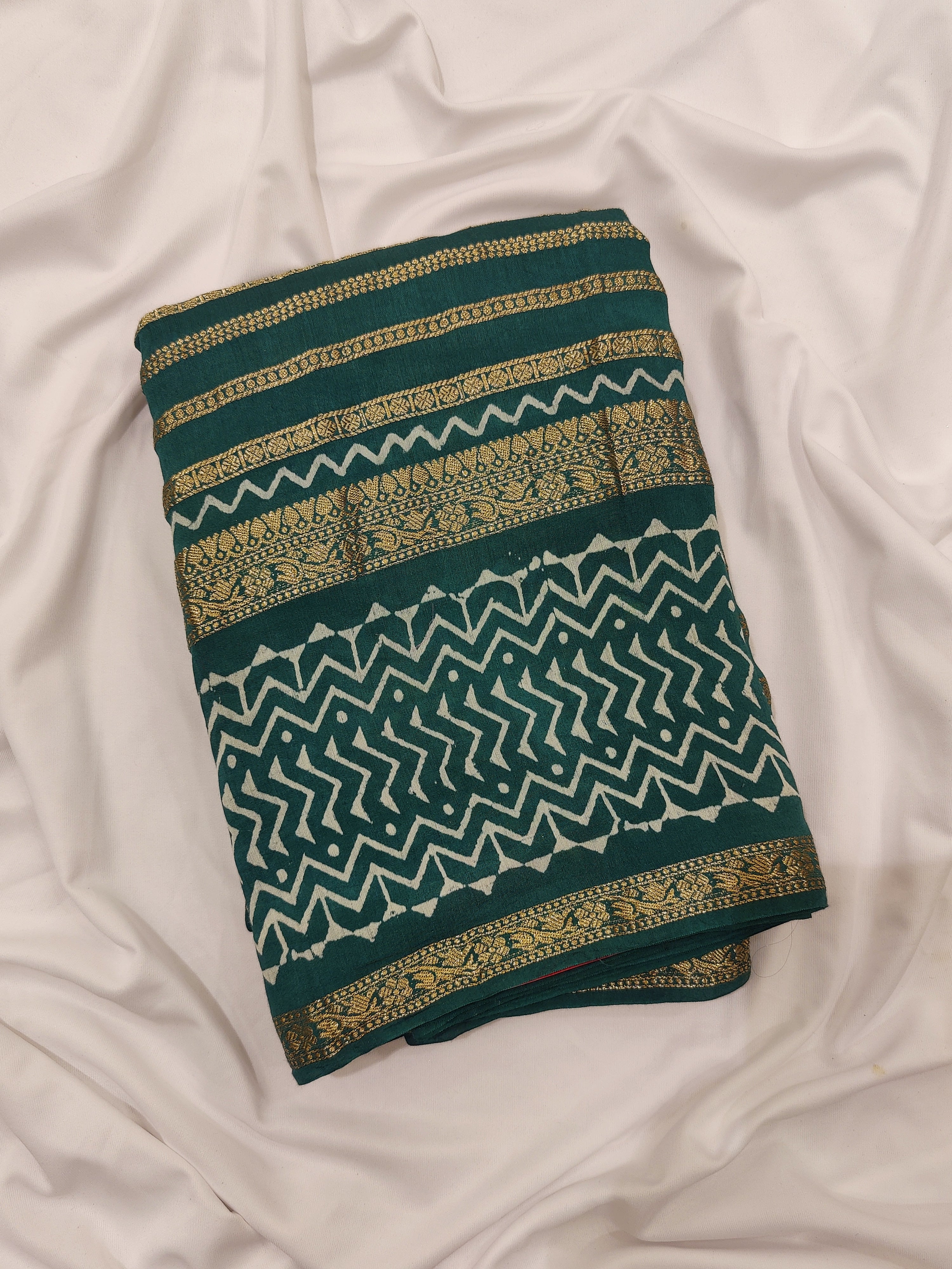 Rama Green Fancy Raw Silk Saree with Gold Zari – A Perfect Blend of Tradition and Glamour