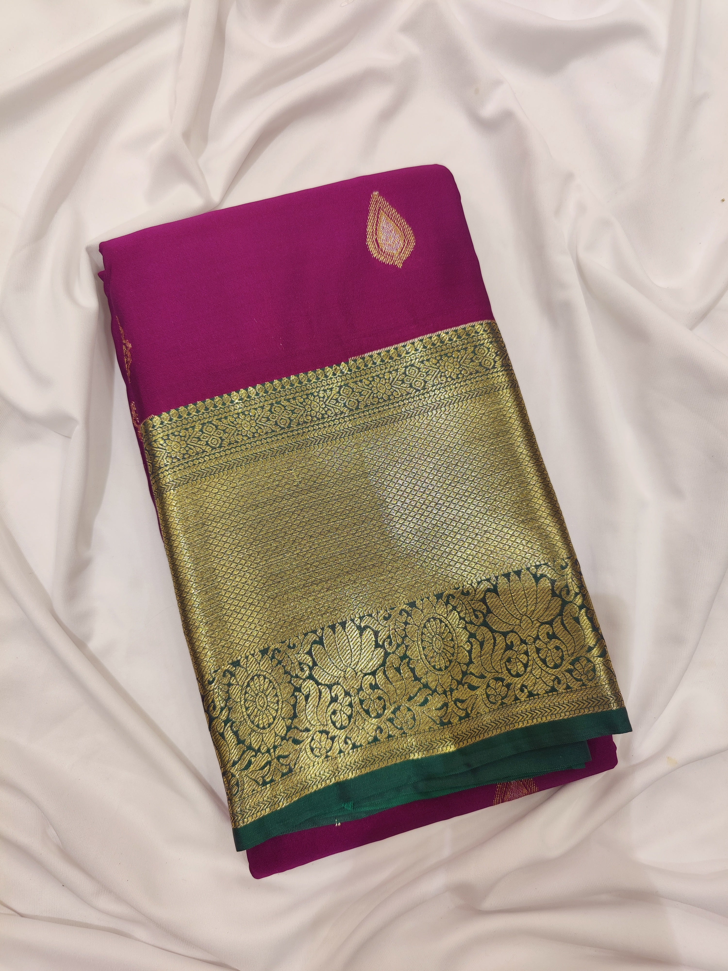 Wine Saree with Green Contrast Border – A Regal Statement of Elegance - New Sudarshan Silks`