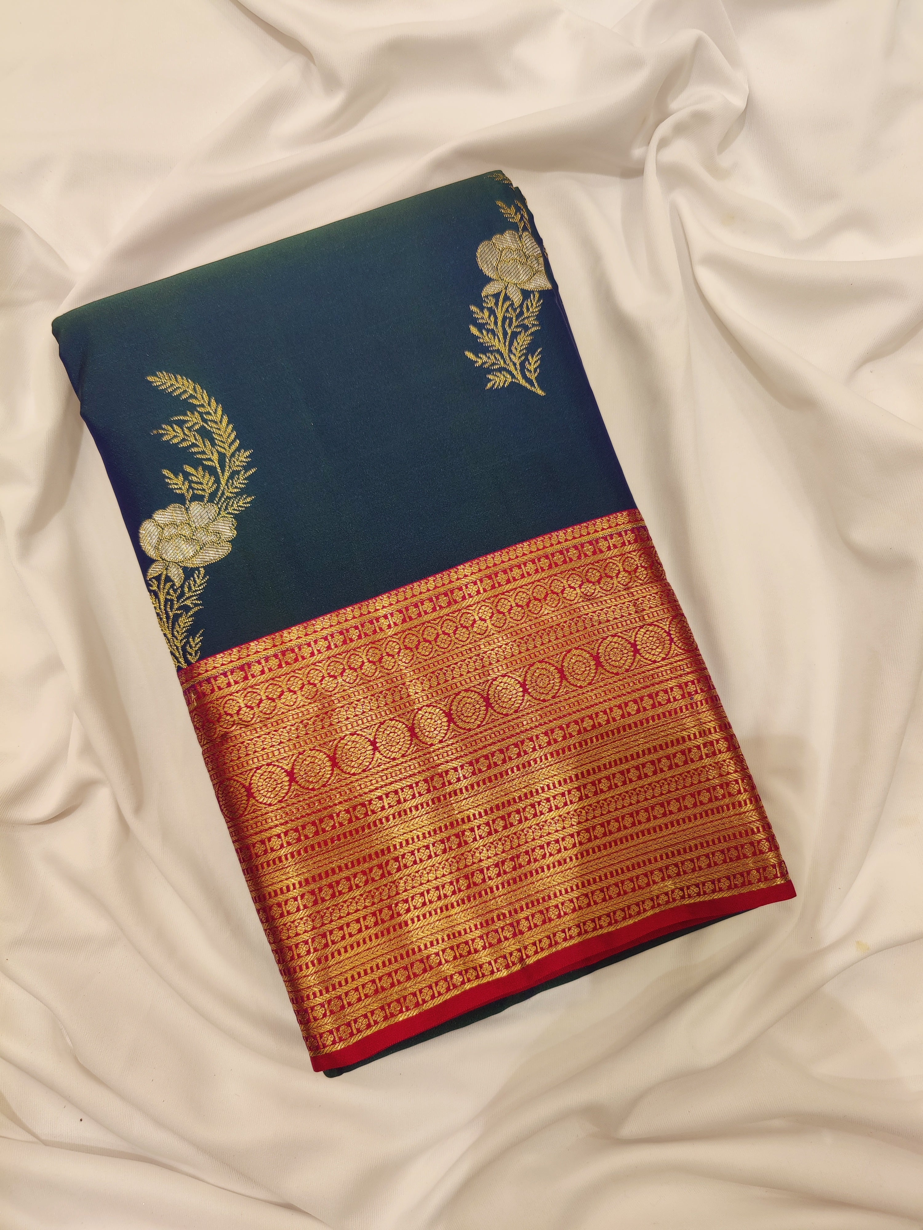 Peacock Blue Saree with Red Border – Traditional Elegance in a Grand Silken Drape - New Sudarshan Silks`