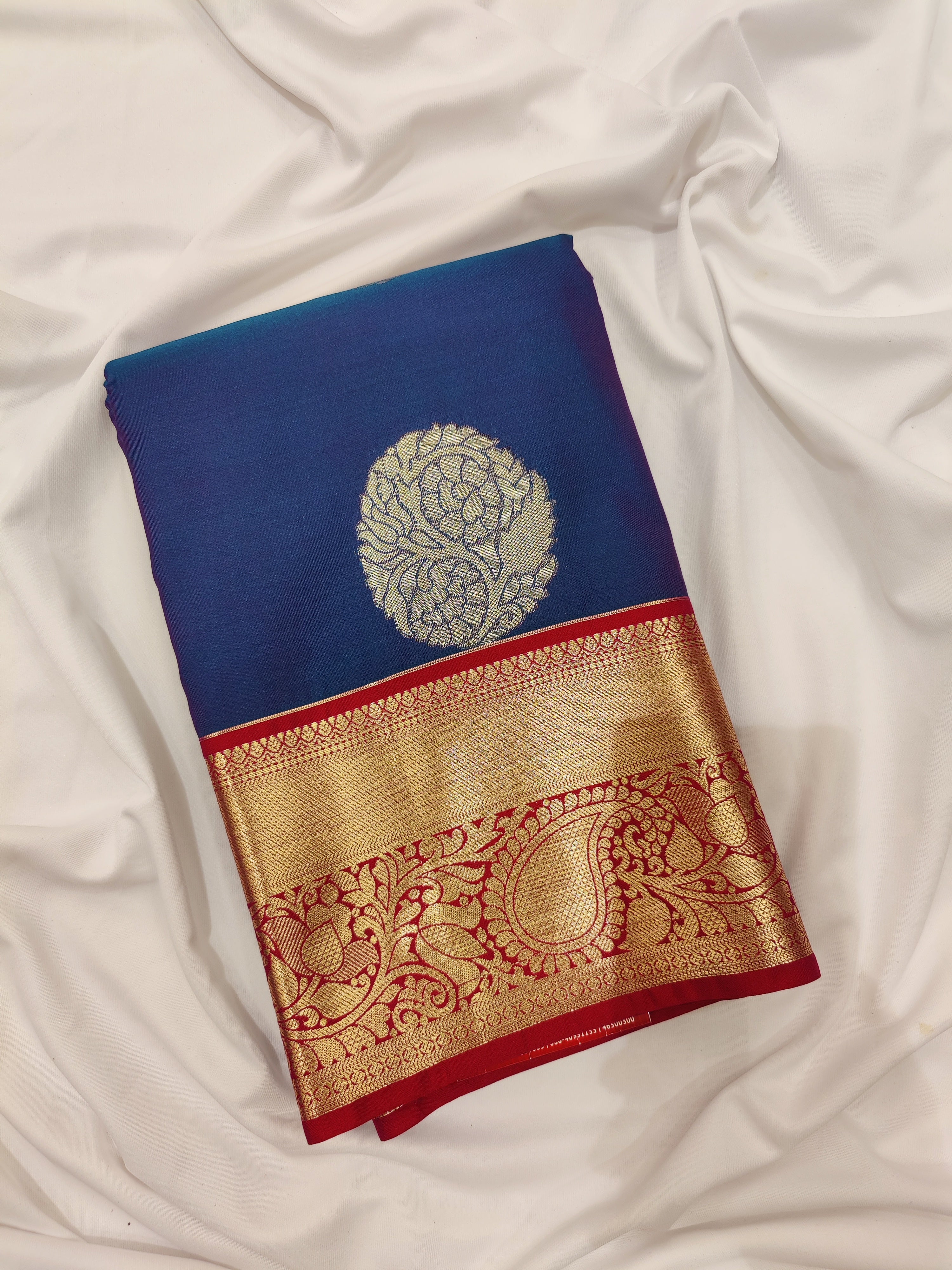 Peacock Blue Semi Kanchi Silk Saree with Red Border – Timeless Festive Charm - New Sudarshan Silks`