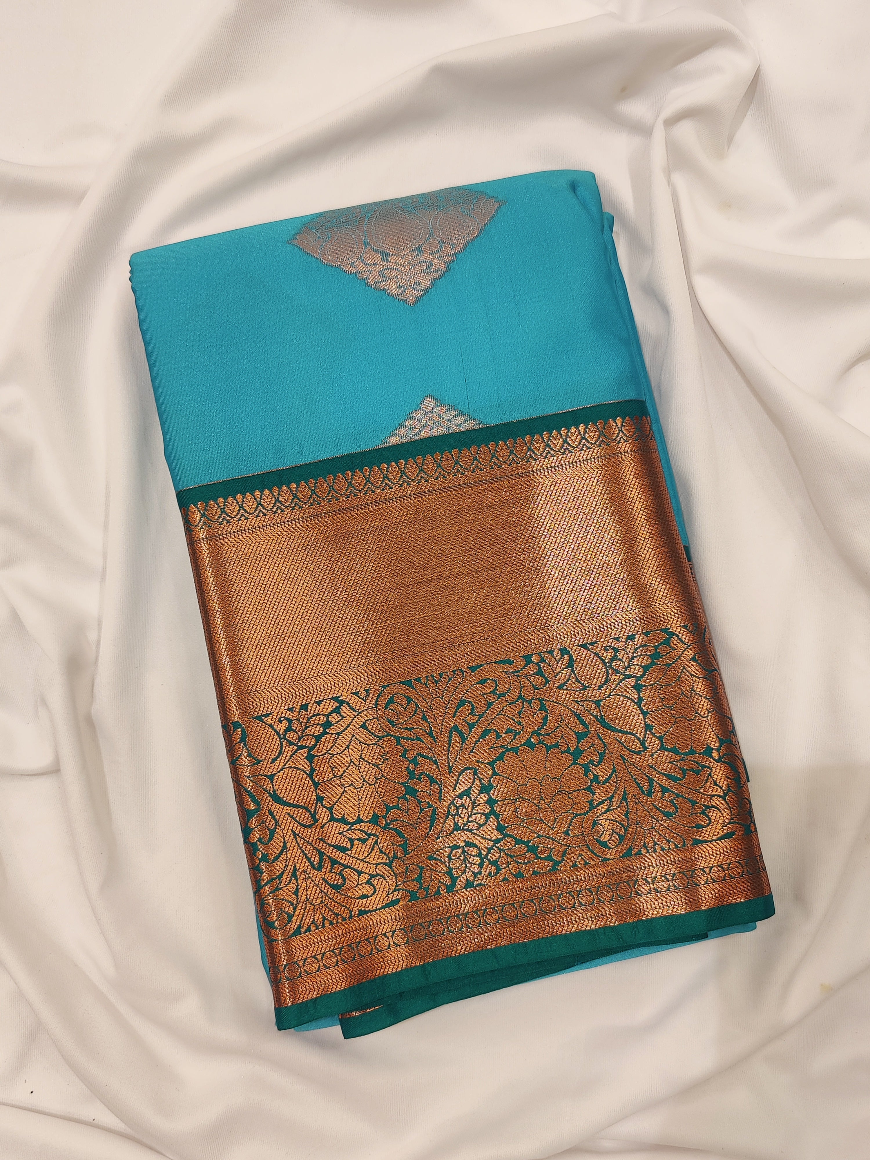 Sky Blue Fancy Silk Saree with Green Border – Elegant and Vibrant Charm