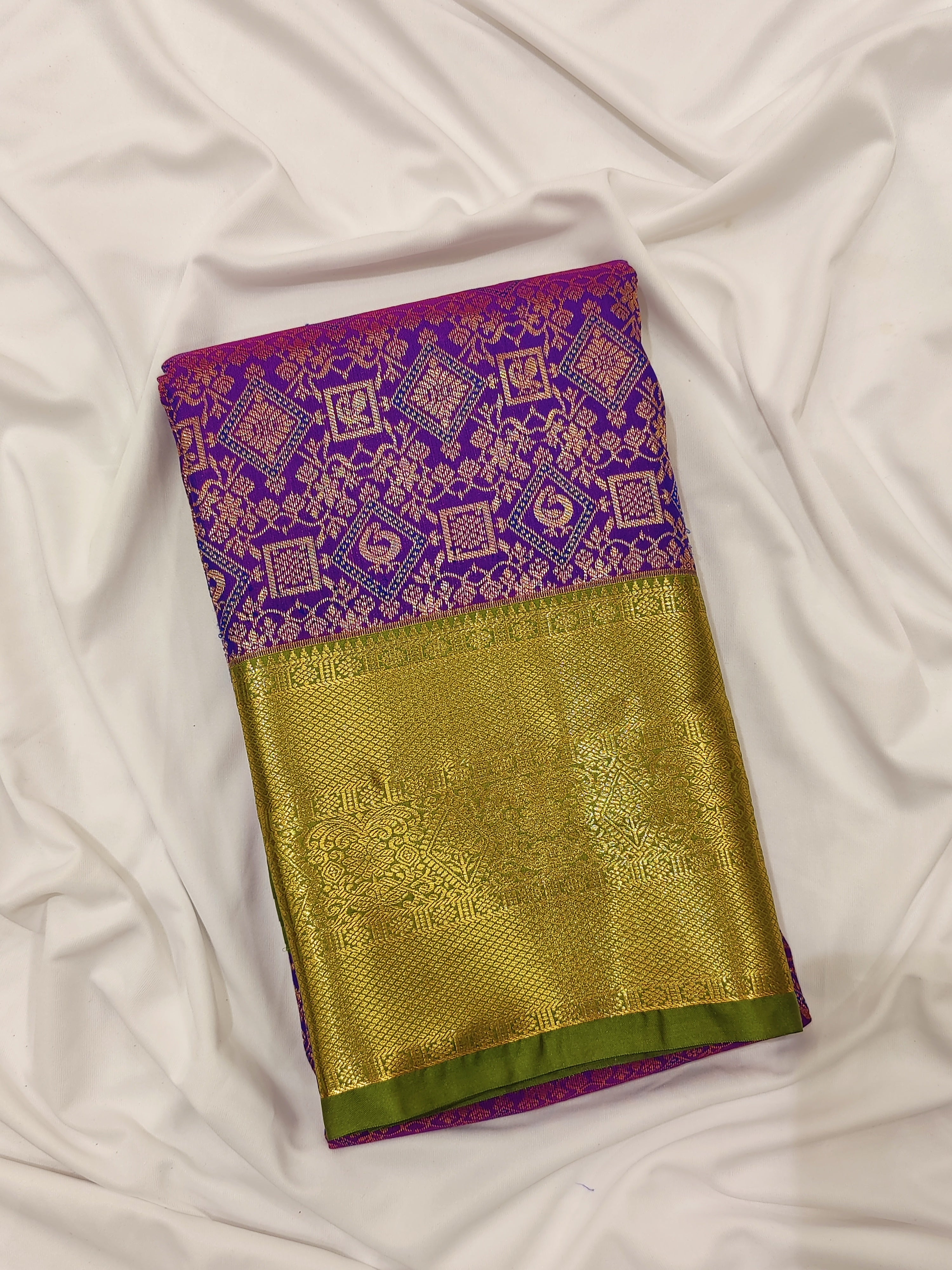 Violet Brocade Saree with Green Border – New Arrival