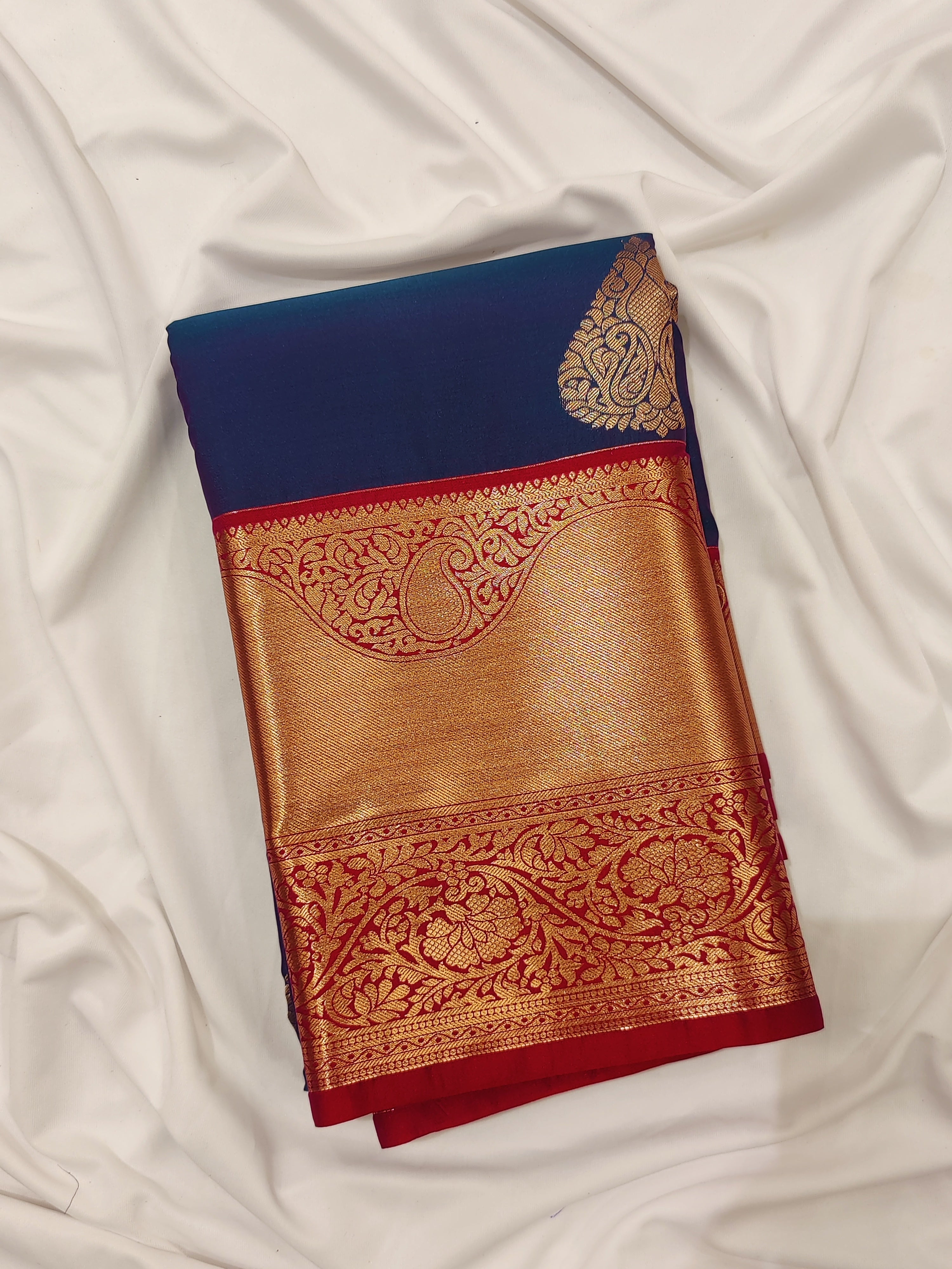Peacock Blue Semi Silk Saree with Red & Copper Zari Border - New Sudarshan Silks`