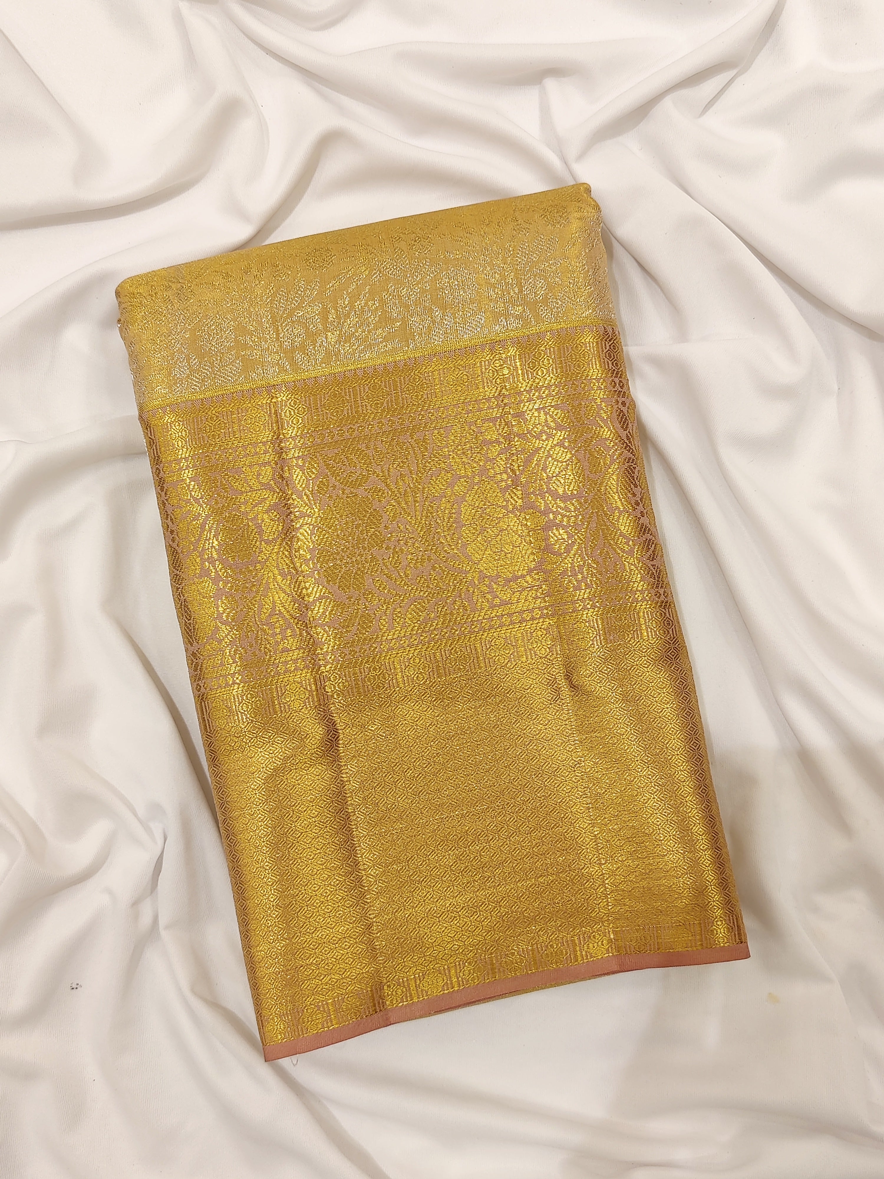 Cream Wedding Saree with Gold Zari Work – A Classic Bridal Beauty