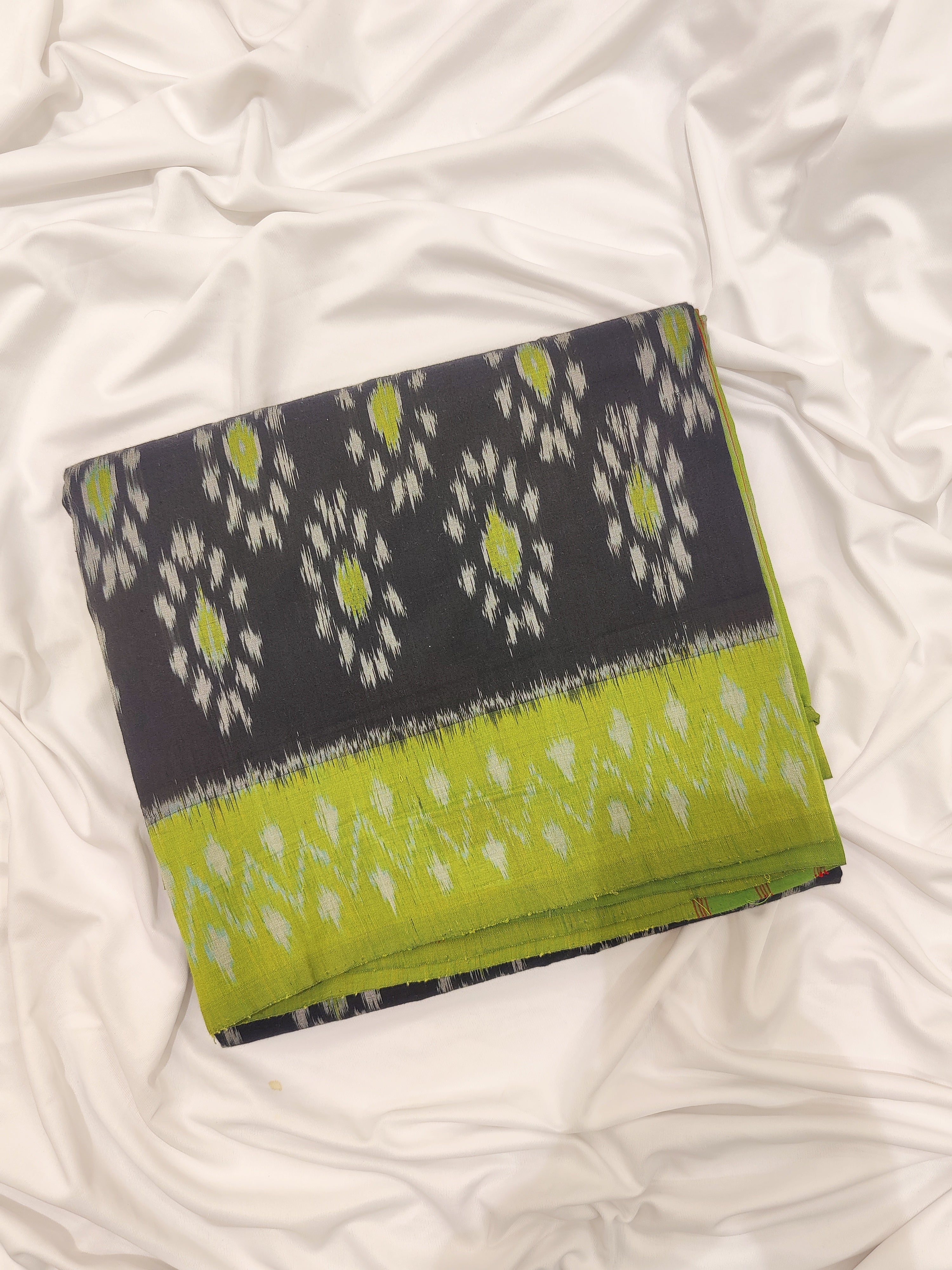 Elegant Black Pochampalli Cotton Saree with Ikat Design & Leaf Green Border