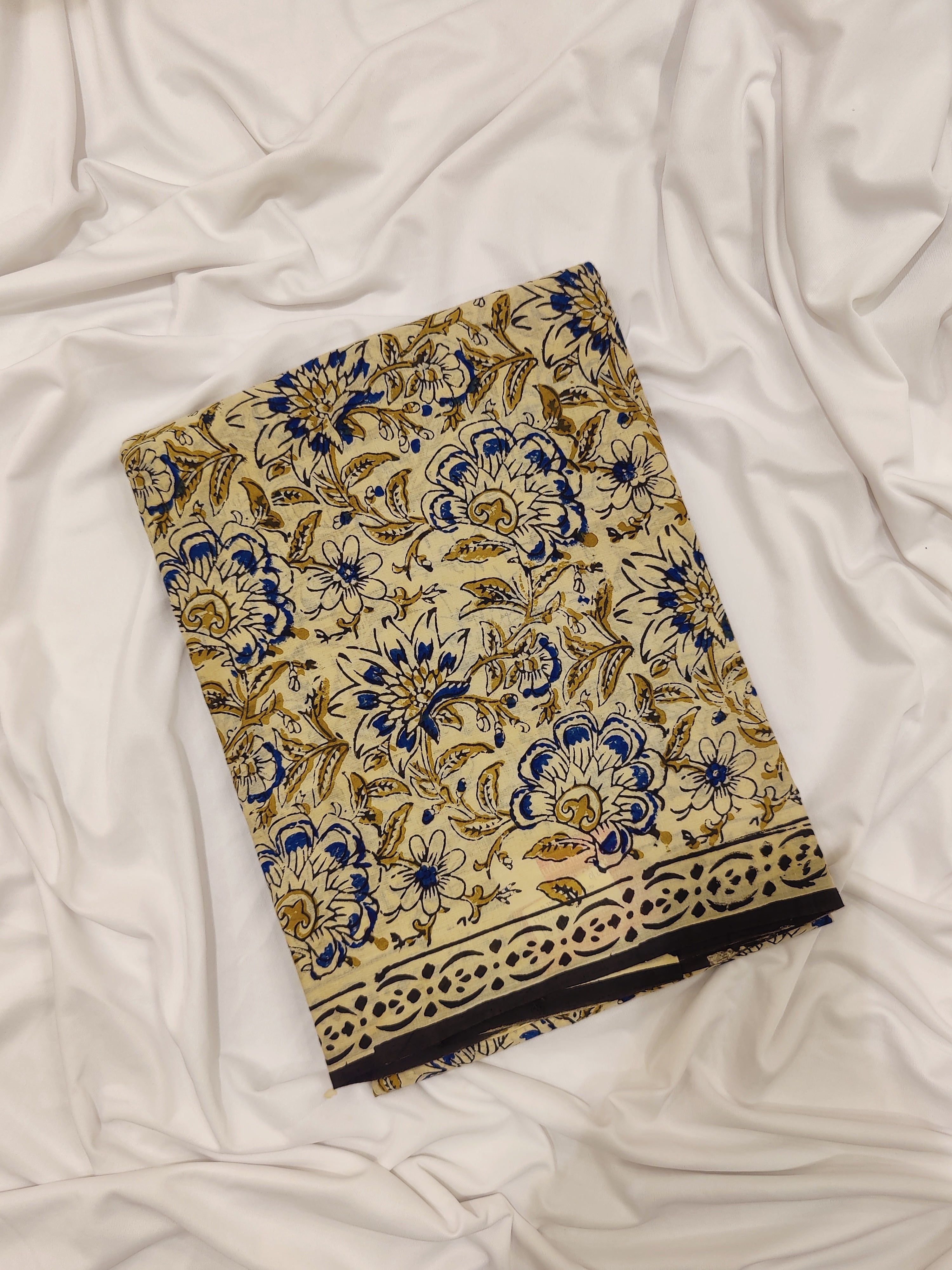 Elegant Cream Cotton Saree with Floral Design & Black Border