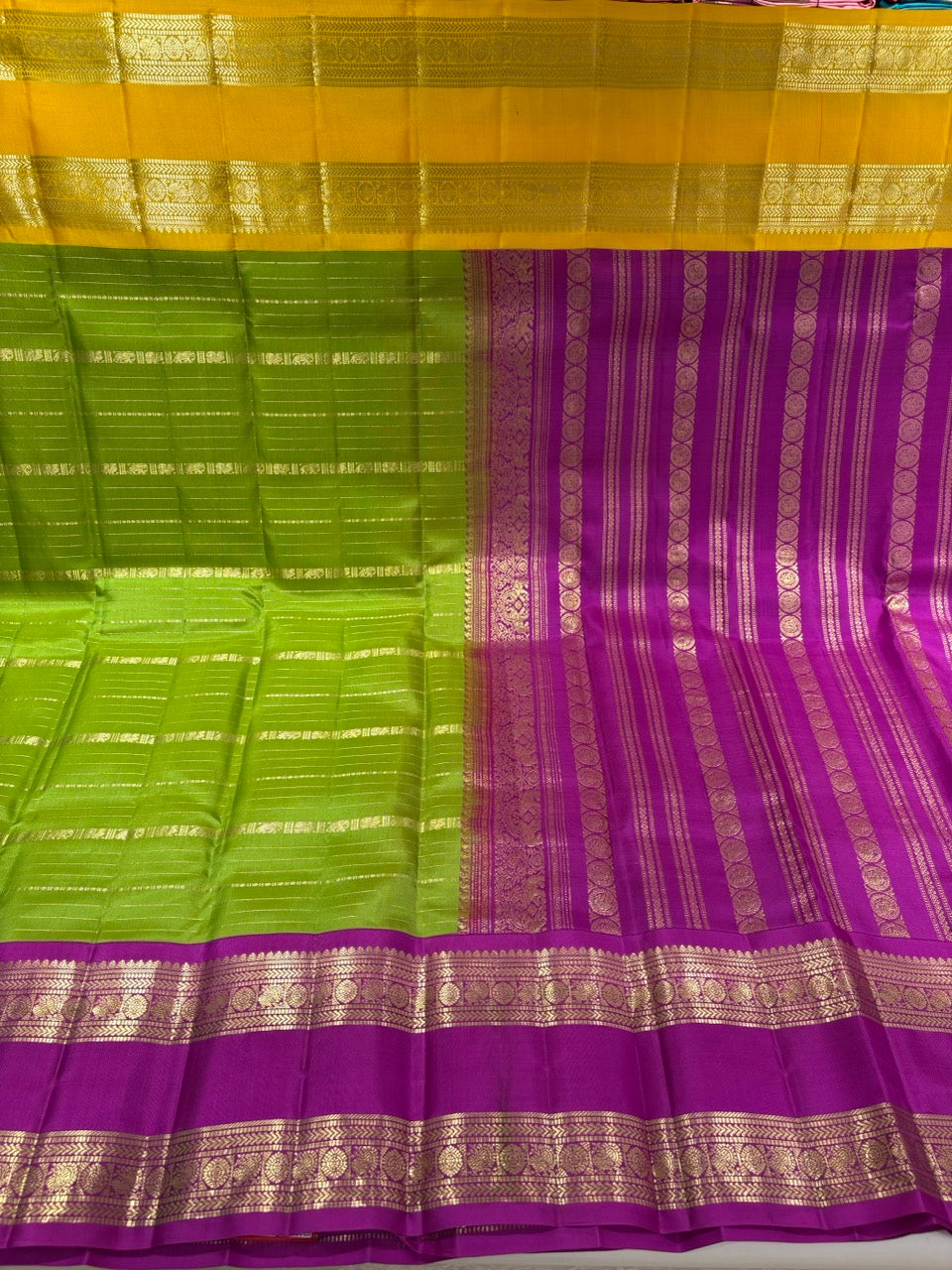 Leaf Green Colour Ganga Jamuna Saree with Lavender & Yellow Border