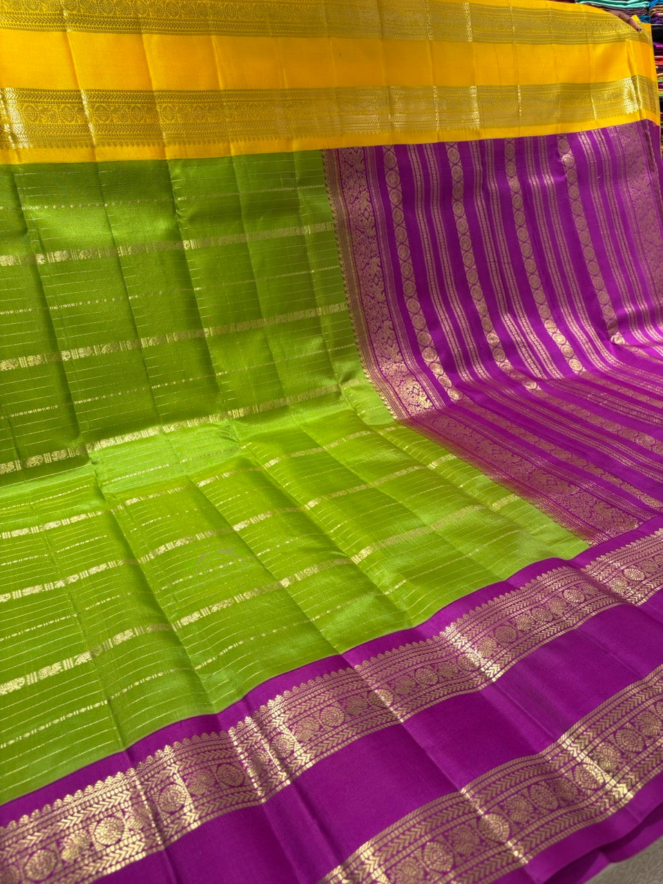 Leaf Green Colour Ganga Jamuna Saree with Lavender & Yellow Border