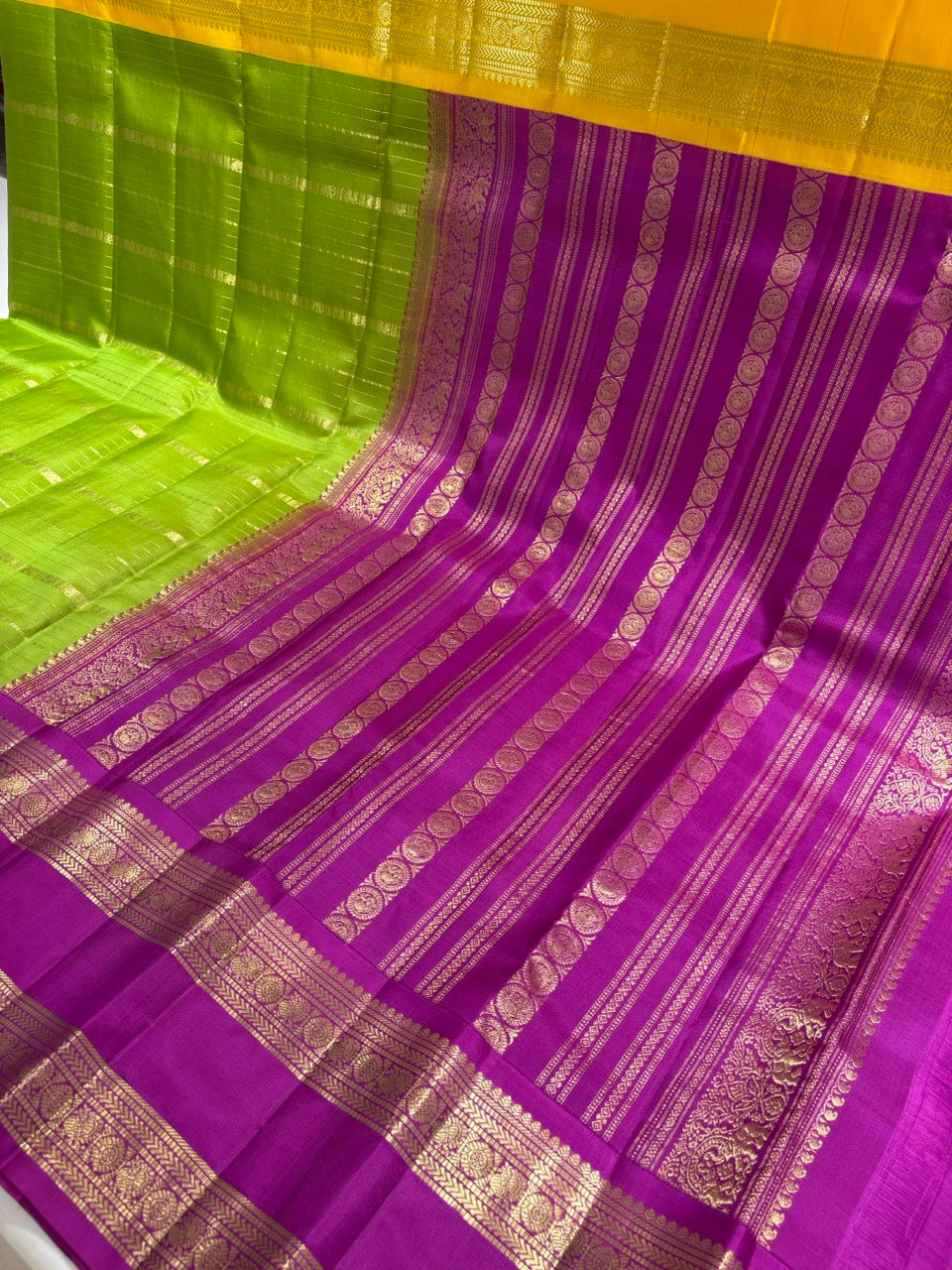 Leaf Green Colour Ganga Jamuna Saree with Lavender & Yellow Border