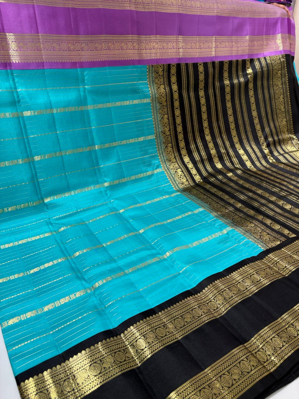 Sky Blue Colour Ganga Jamuna Saree with Black & Lavender Border
