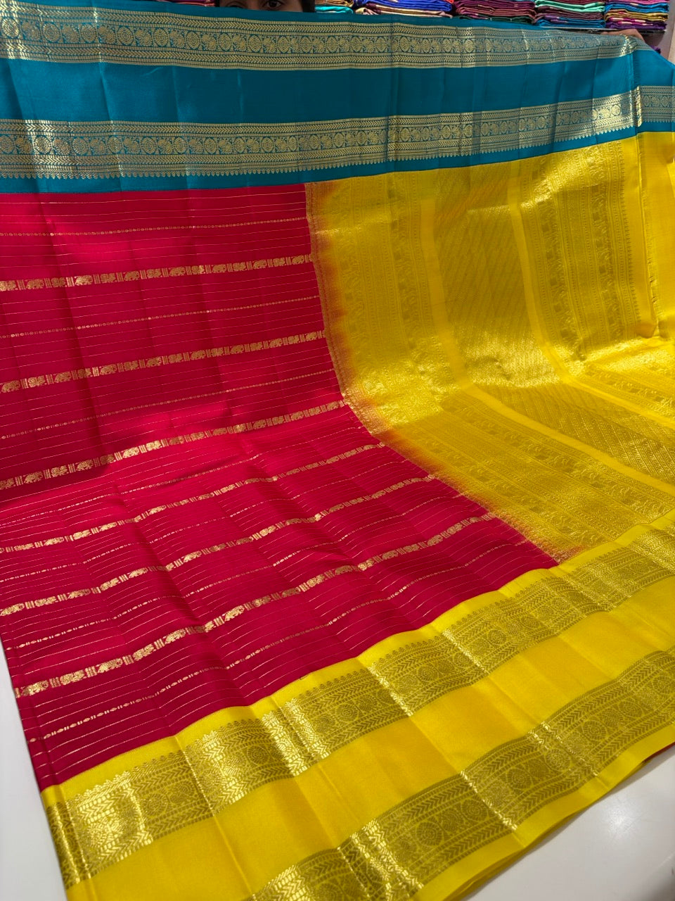 Red Colour Ganga Jamuna Saree with Yellow & Sky Blue Border