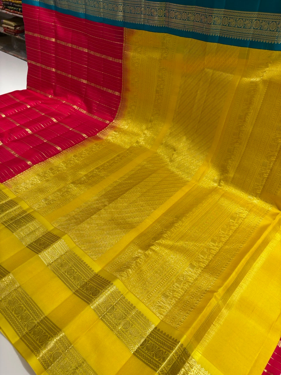 Red Colour Ganga Jamuna Saree with Yellow & Sky Blue Border