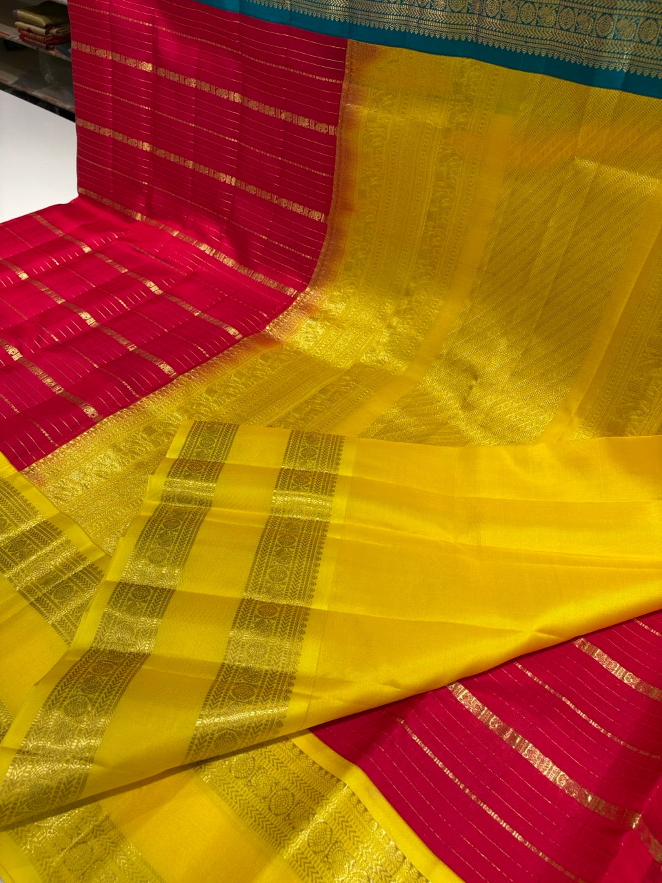 Red Colour Ganga Jamuna Saree with Yellow & Sky Blue Border