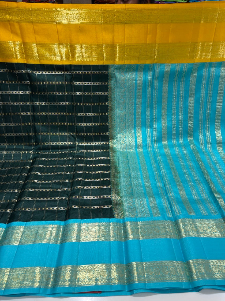 Bottle Green Colour Ganga Jamuna Saree with Sky Blue & Yellow Border