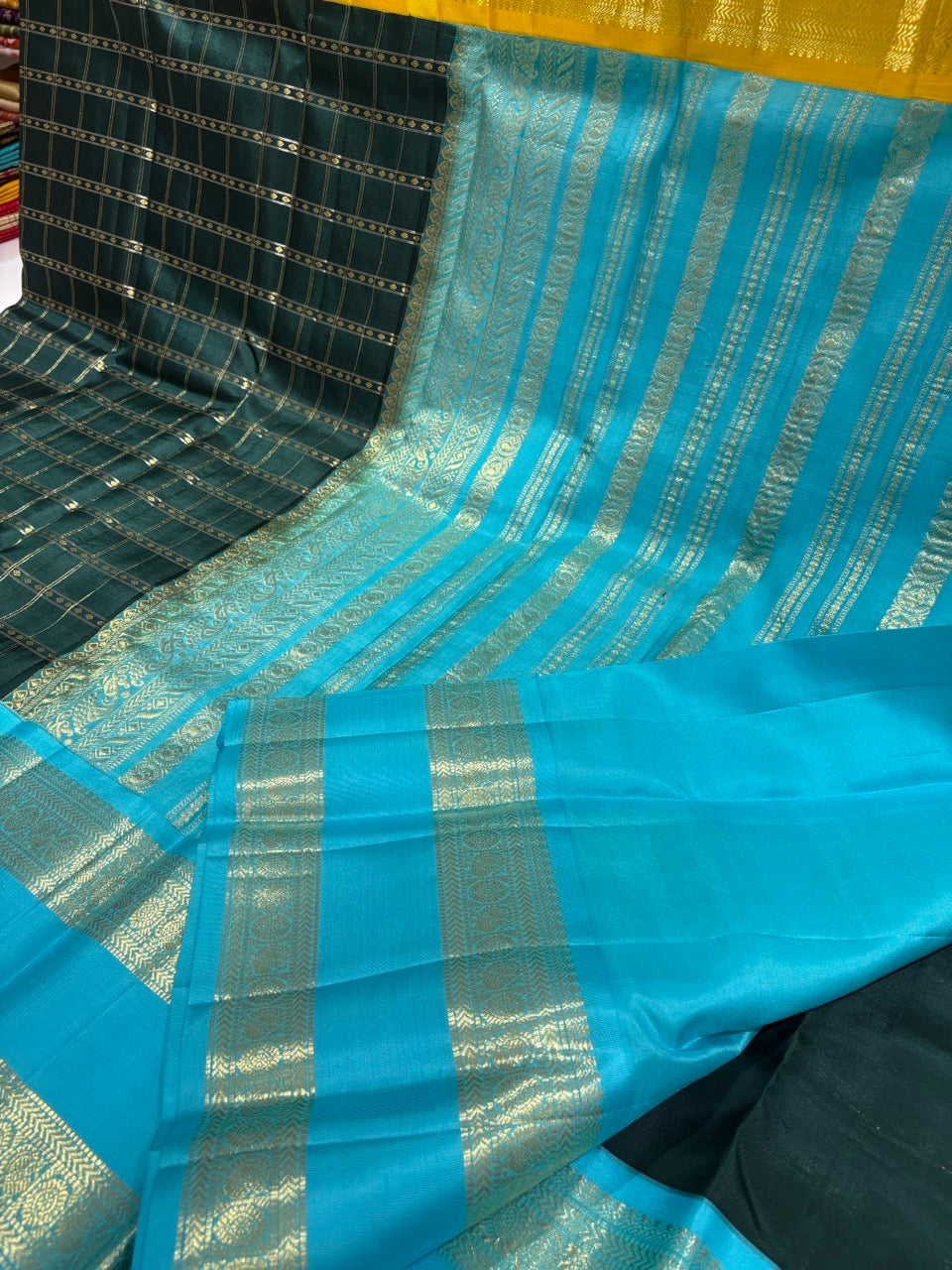 Bottle Green Colour Ganga Jamuna Saree with Sky Blue & Yellow Border