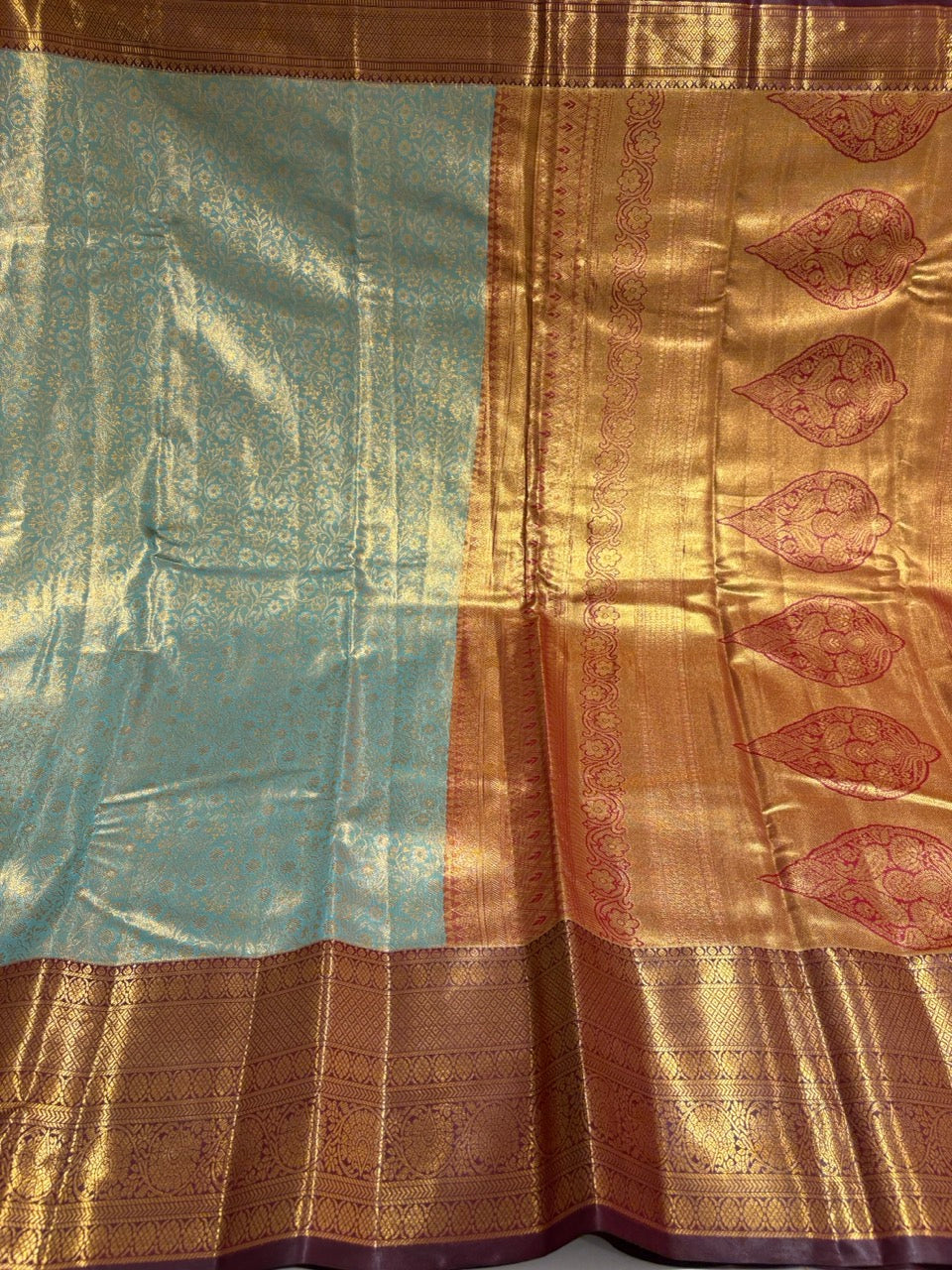 Aqua Blue Colour Semi Tissue Silk Saree with Maroon Border