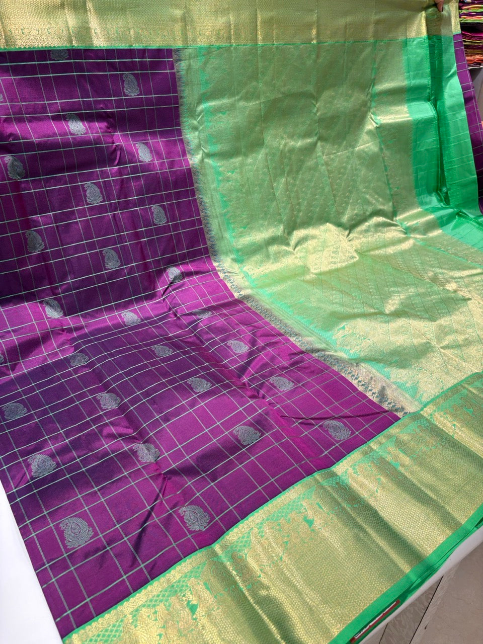 Lustrous Purple Colour Saree with Light Green Border