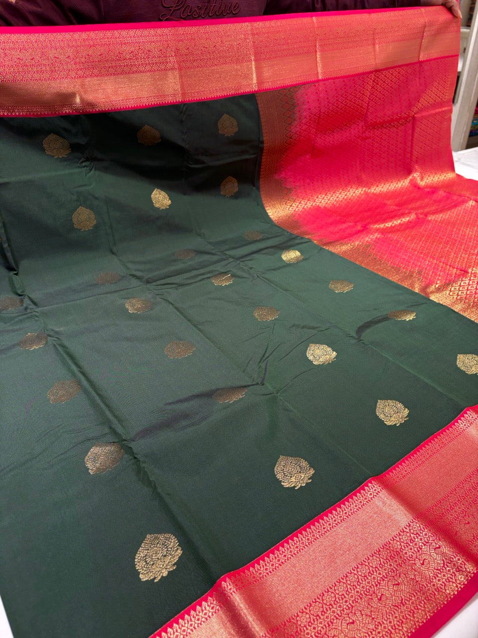Emerald Green Colour Semi Kanchipuram  Silk Saree with Pink Contrast