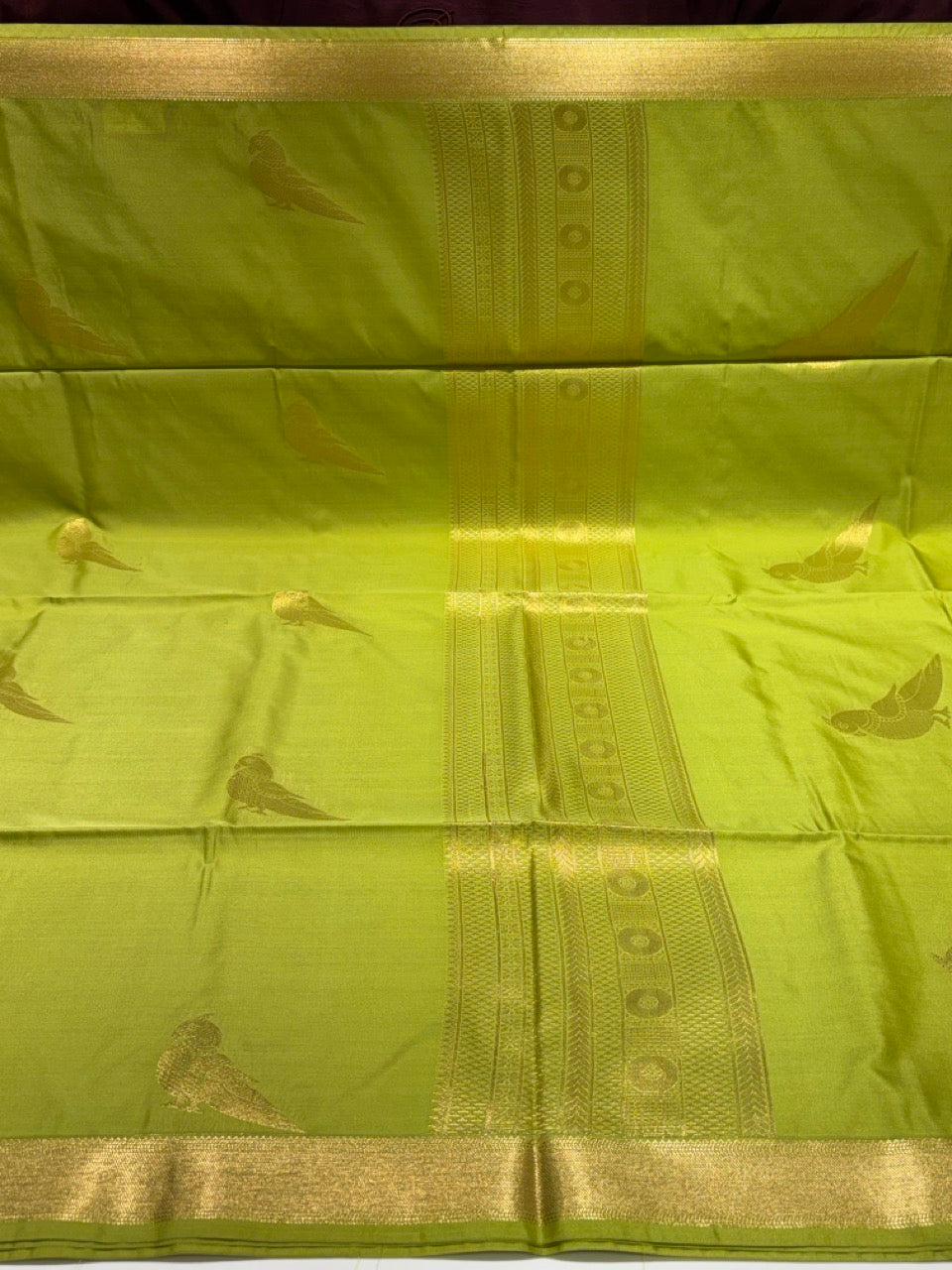 Olive Green Colour Semi Silk Saree with Gold Zari Border & Parrot Butta