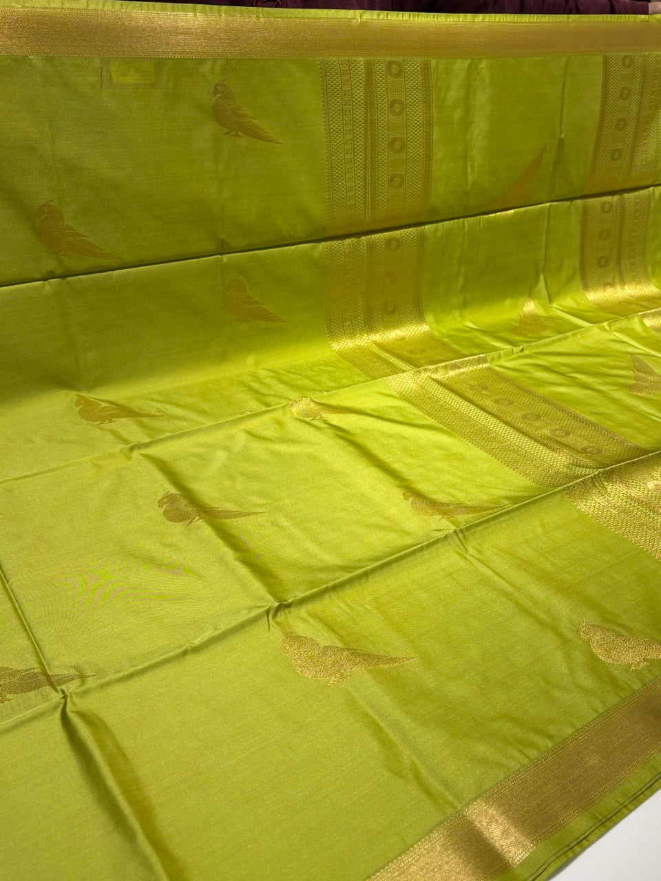 Olive Green Colour Semi Silk Saree with Gold Zari Border & Parrot Butta