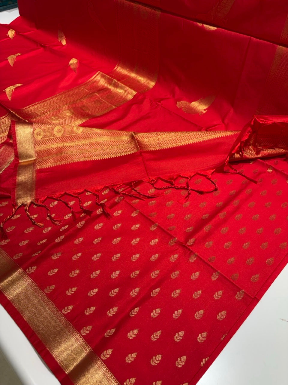 Red Colour Semi Silk Saree with Gold Zari Border & Parrot Butta