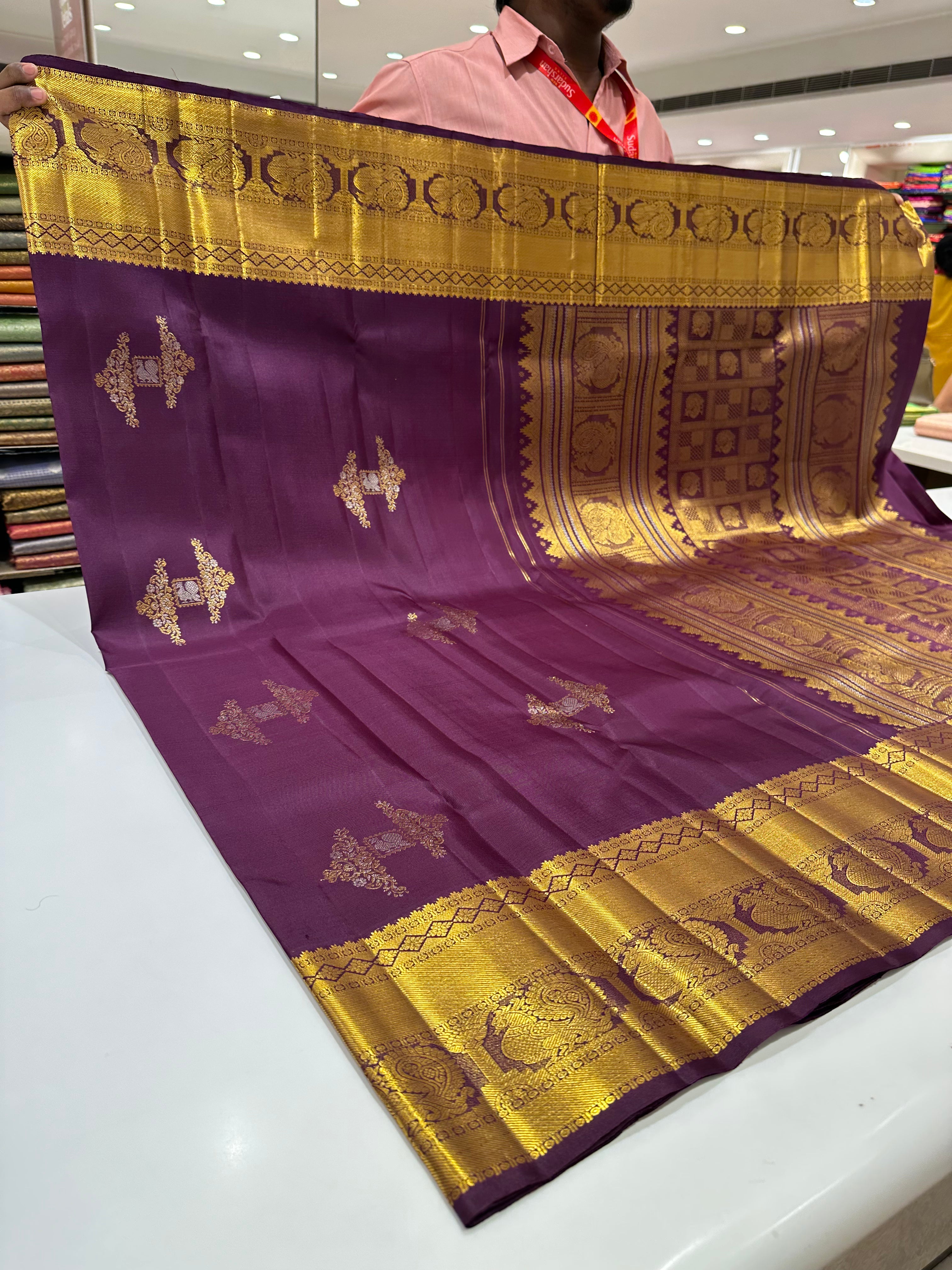 Grand Dark Brown Kanjivaram Saree with Unique Zari Buttas