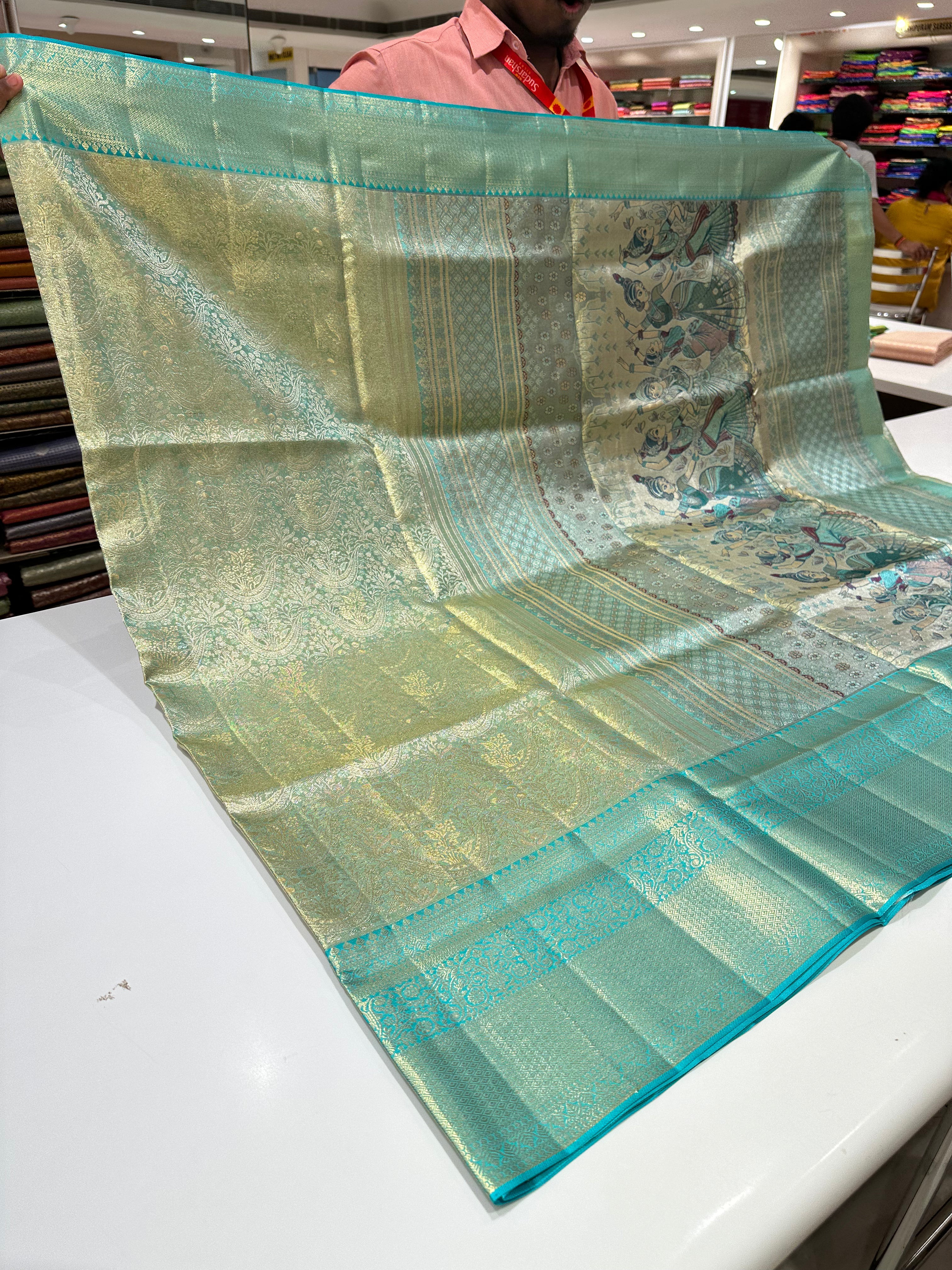 Grand Pista Green Pure Silk Saree with Blue Border and Silver Zari Weaving