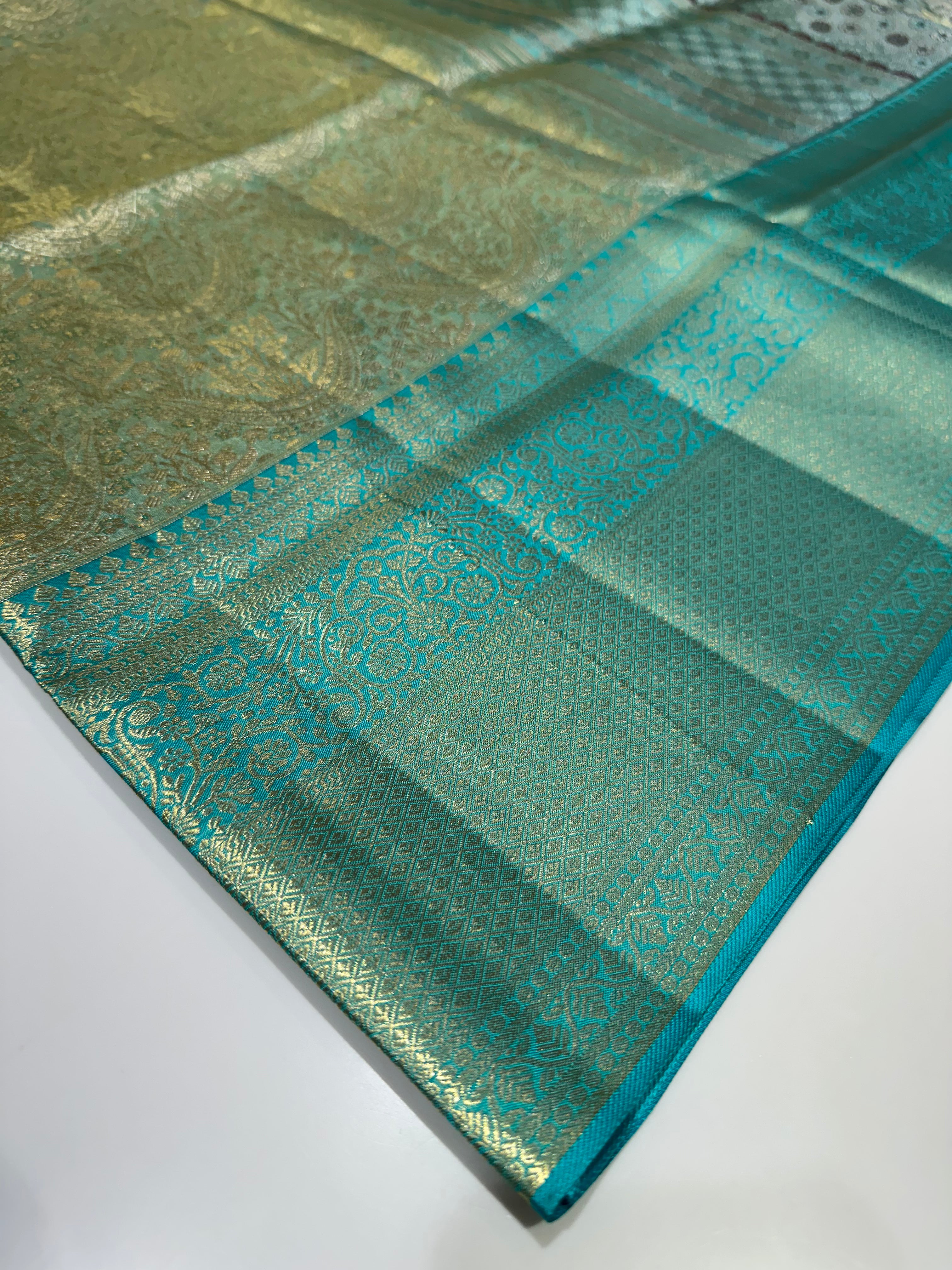 Grand Pista Green Pure Silk Saree with Blue Border and Silver Zari Weaving