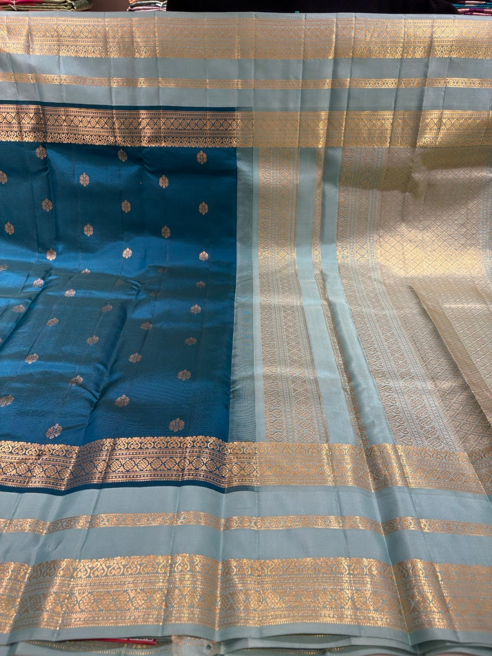 Teal Blue Colour Leela Verse Kanchipuram Silk Saree with Light Blue Contrast NSSL01