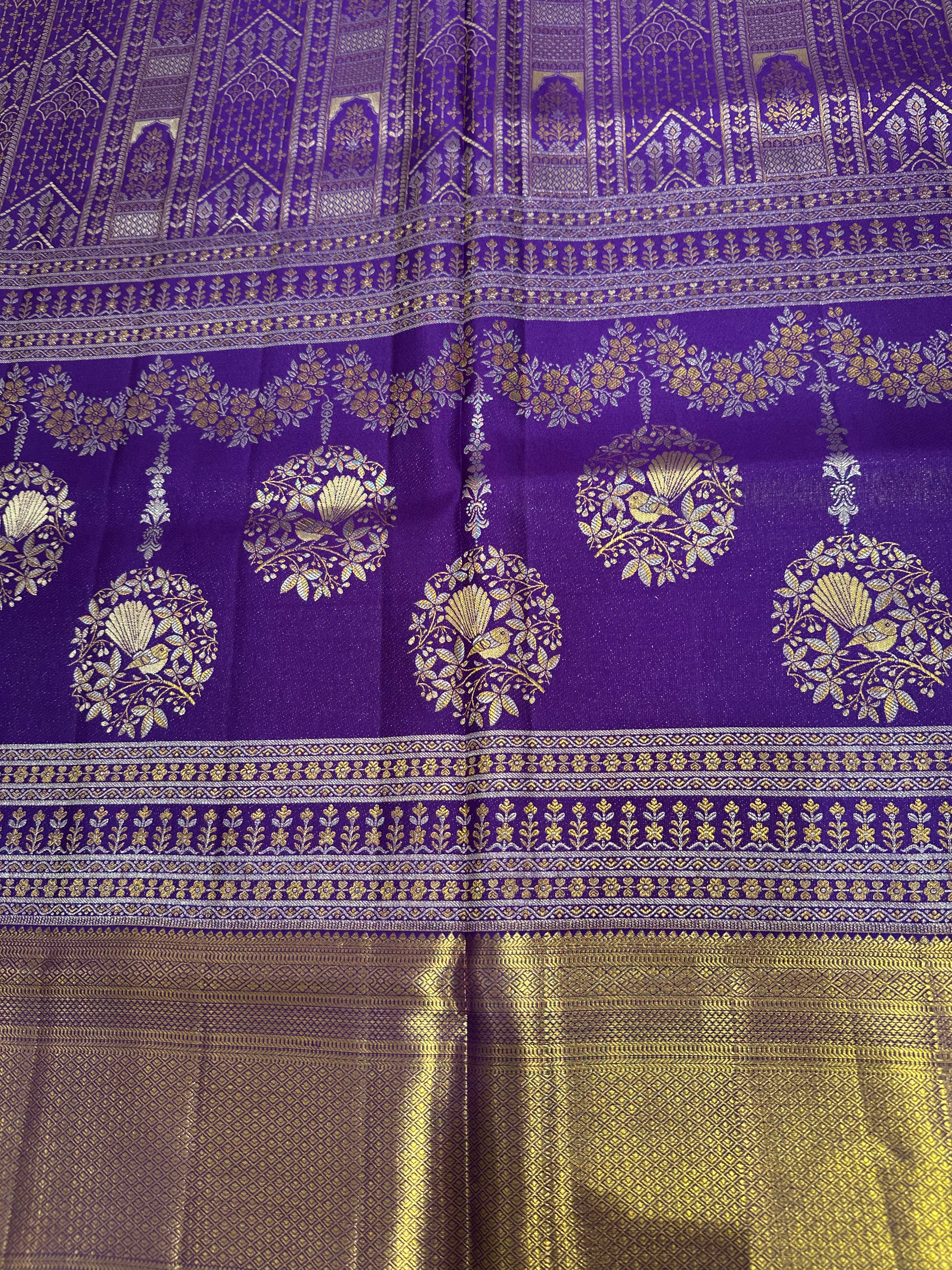 Royal Purple Pure Kanjivaram Silk Saree with Grand Gold & Silver Zari Parrot and Floral Buttas