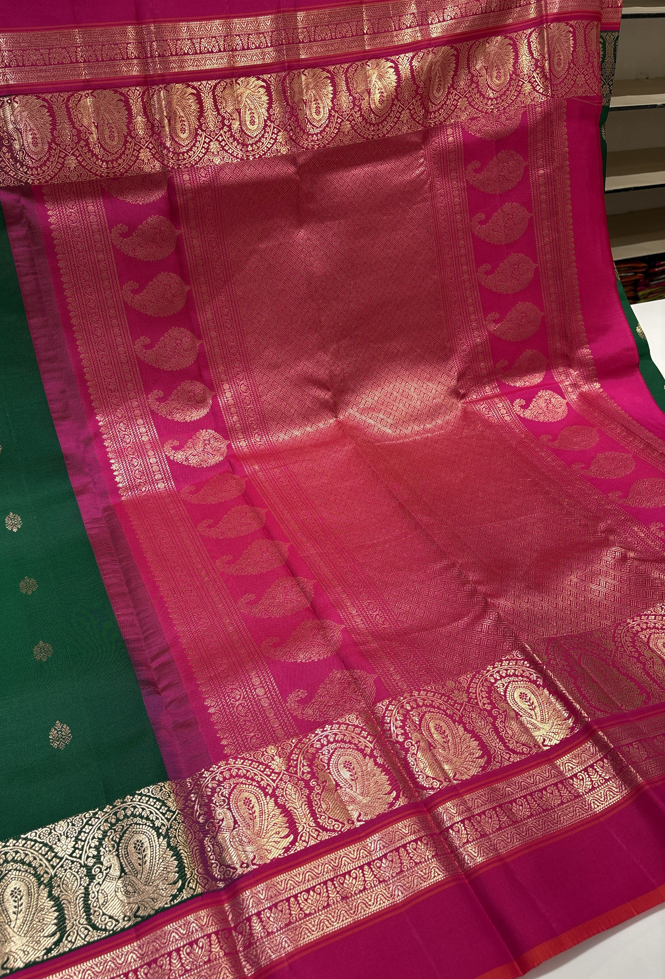 Exquisite Bottle Green Pure Kanjivaram Silk Saree with Magenta Pink Contrast