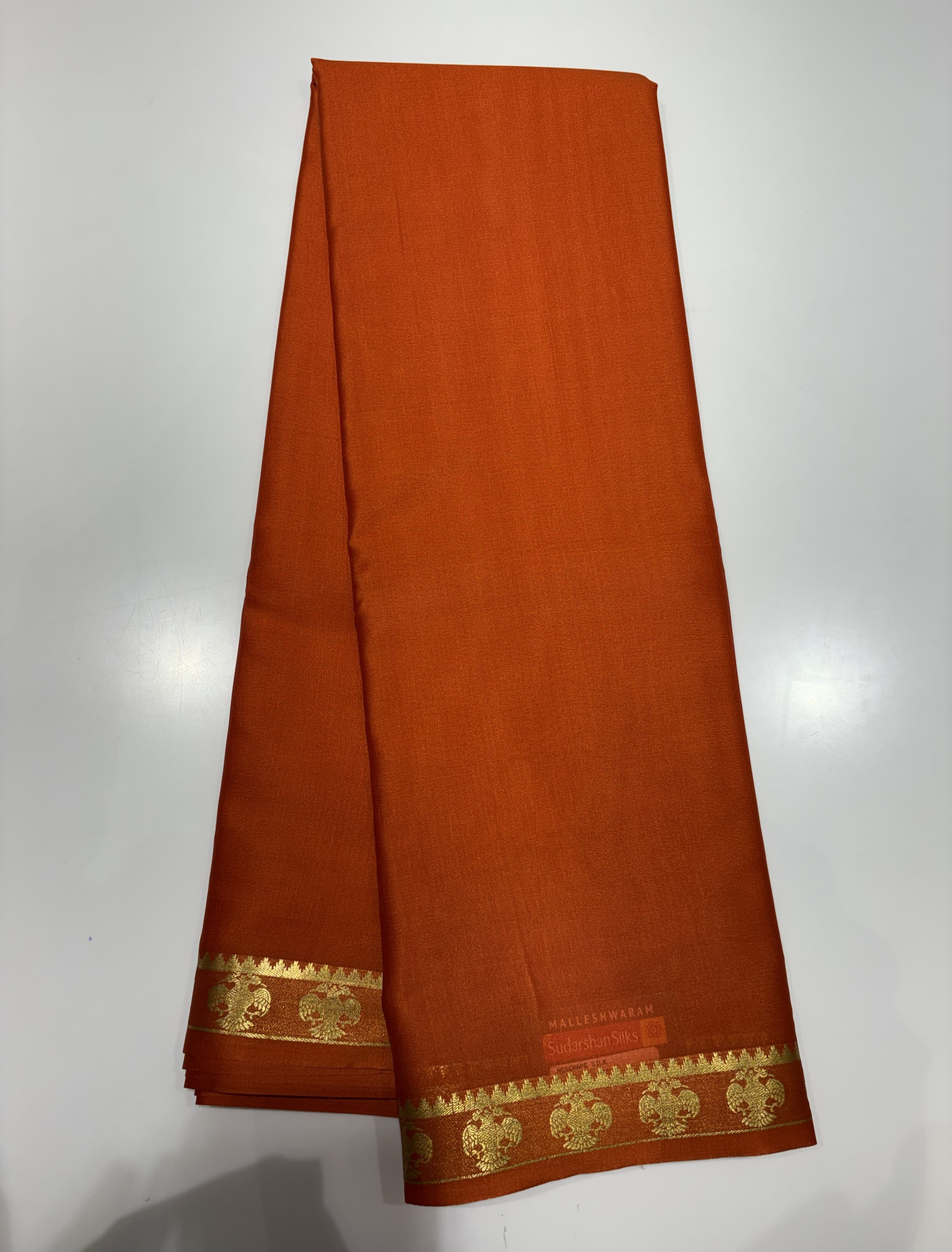 Rust Orange Mysore Silk Crepe Saree(60 gsm) With Gandaberunda motifs Border In gold Zari