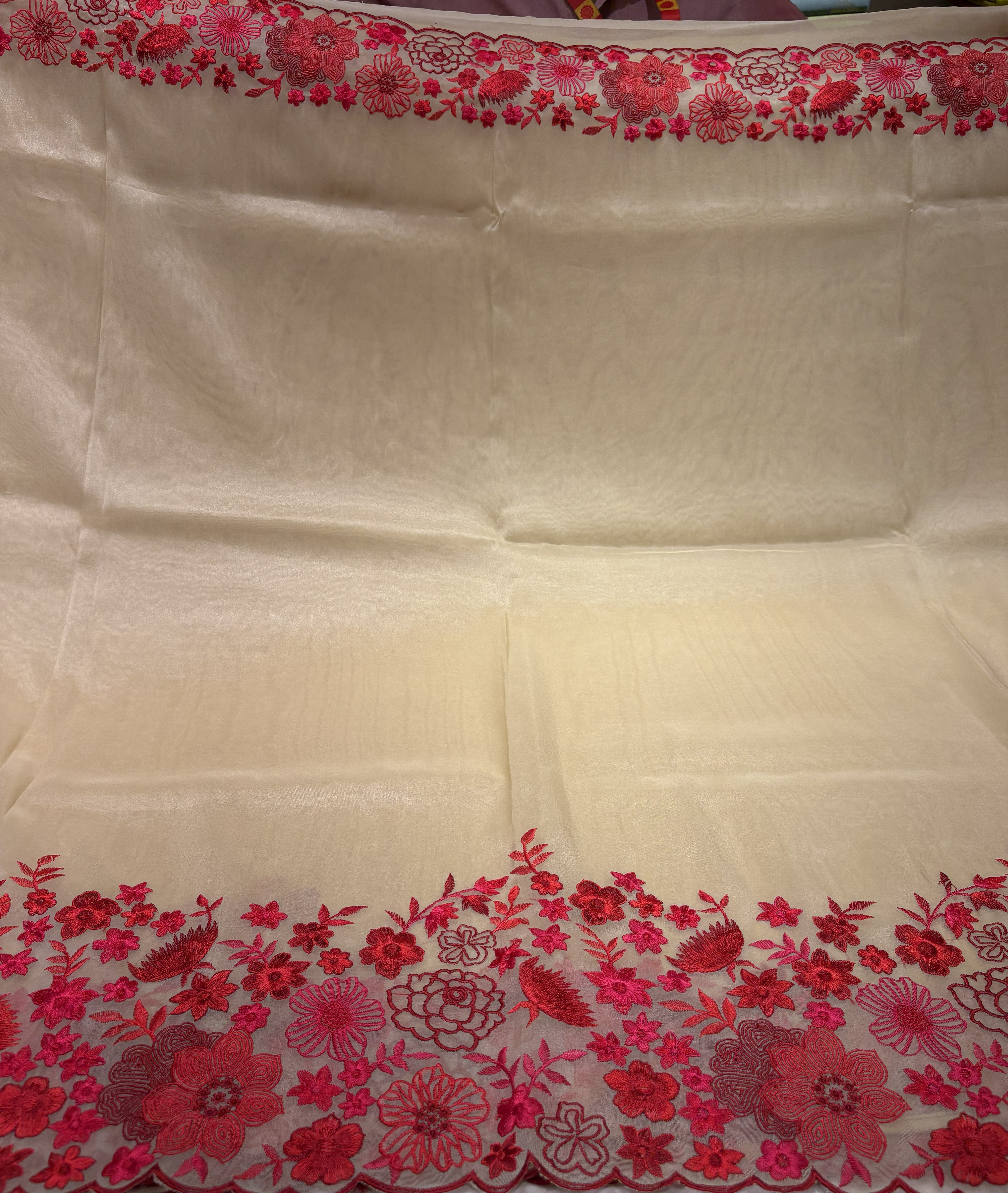 Elegant Cream Tissue Organza Saree With Fancy Red Floral Border