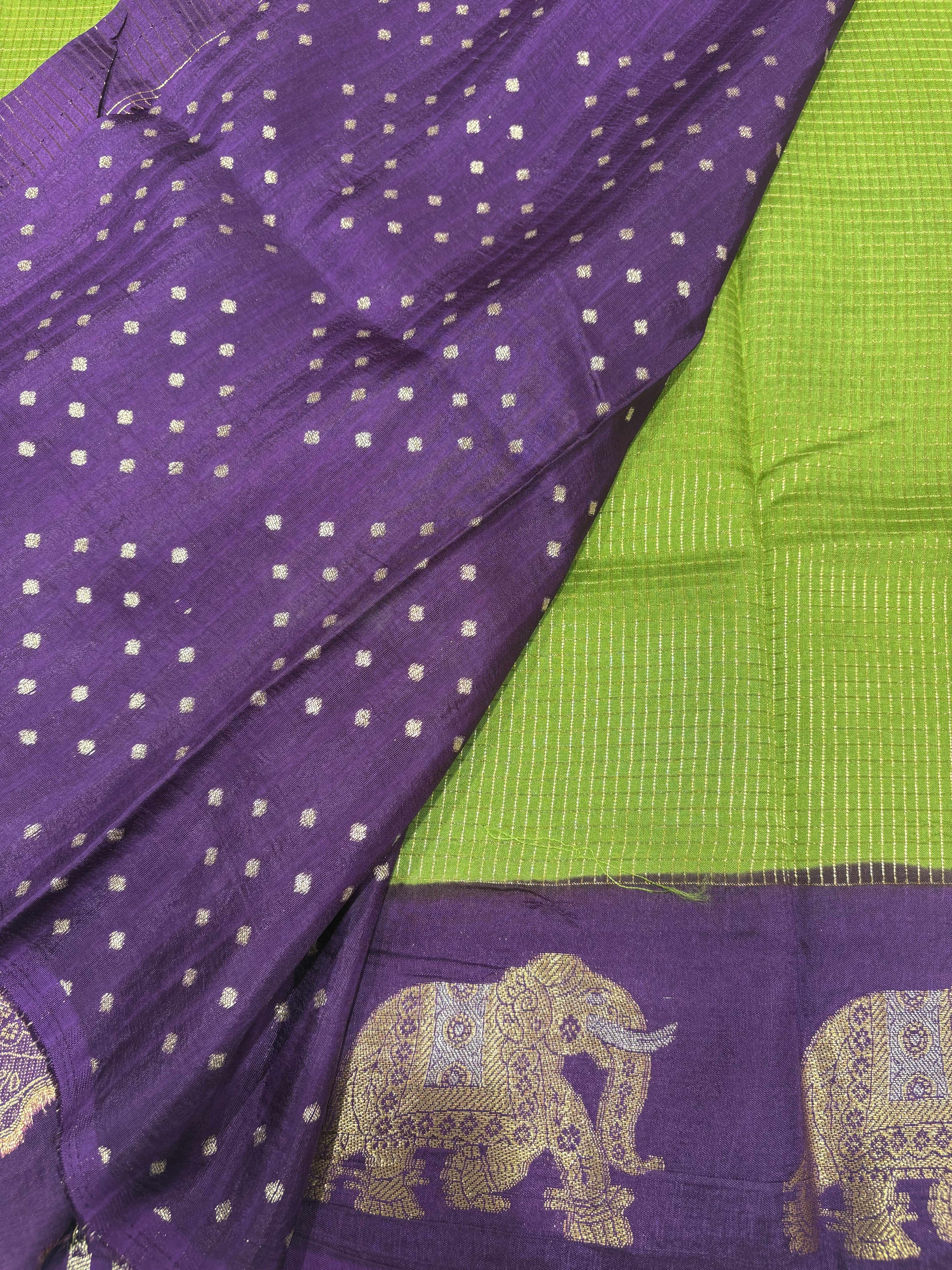 Beautiful Parrot Green Fancy Saree With Purple Contrast And Elephant Motifs on its Border