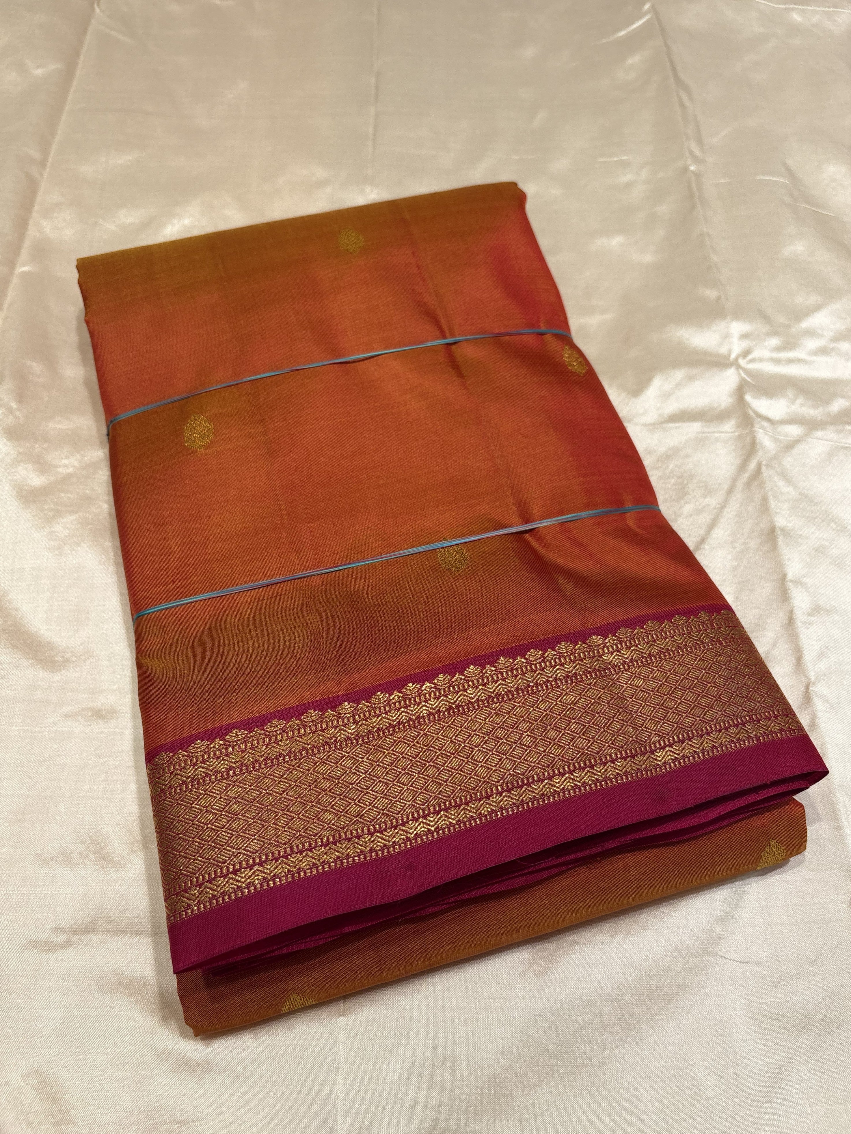 Vibrant Orange Pure Kanchipuram Silk Saree With Rani Pink Contrast