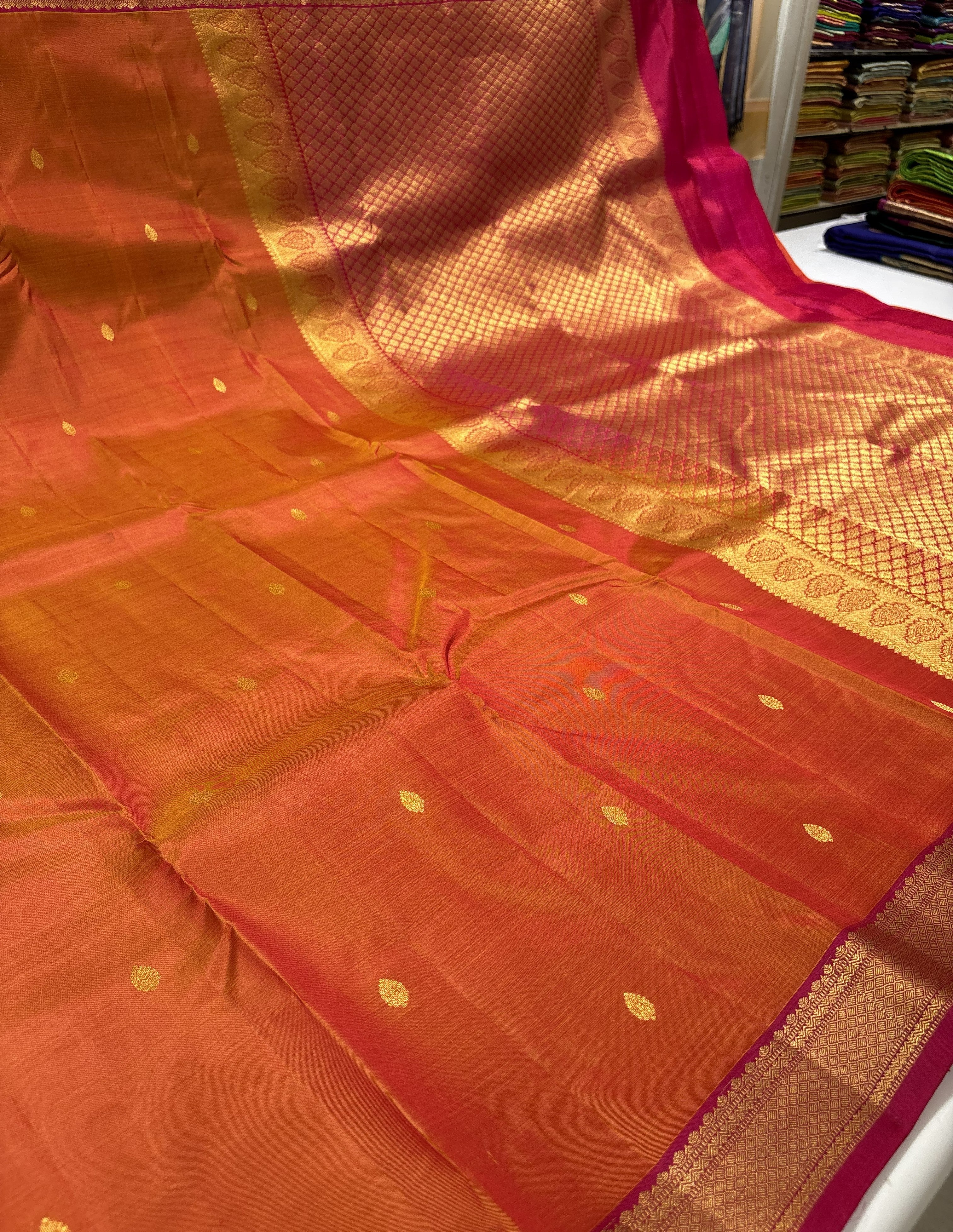 Vibrant Orange Pure Kanchipuram Silk Saree With Rani Pink Contrast