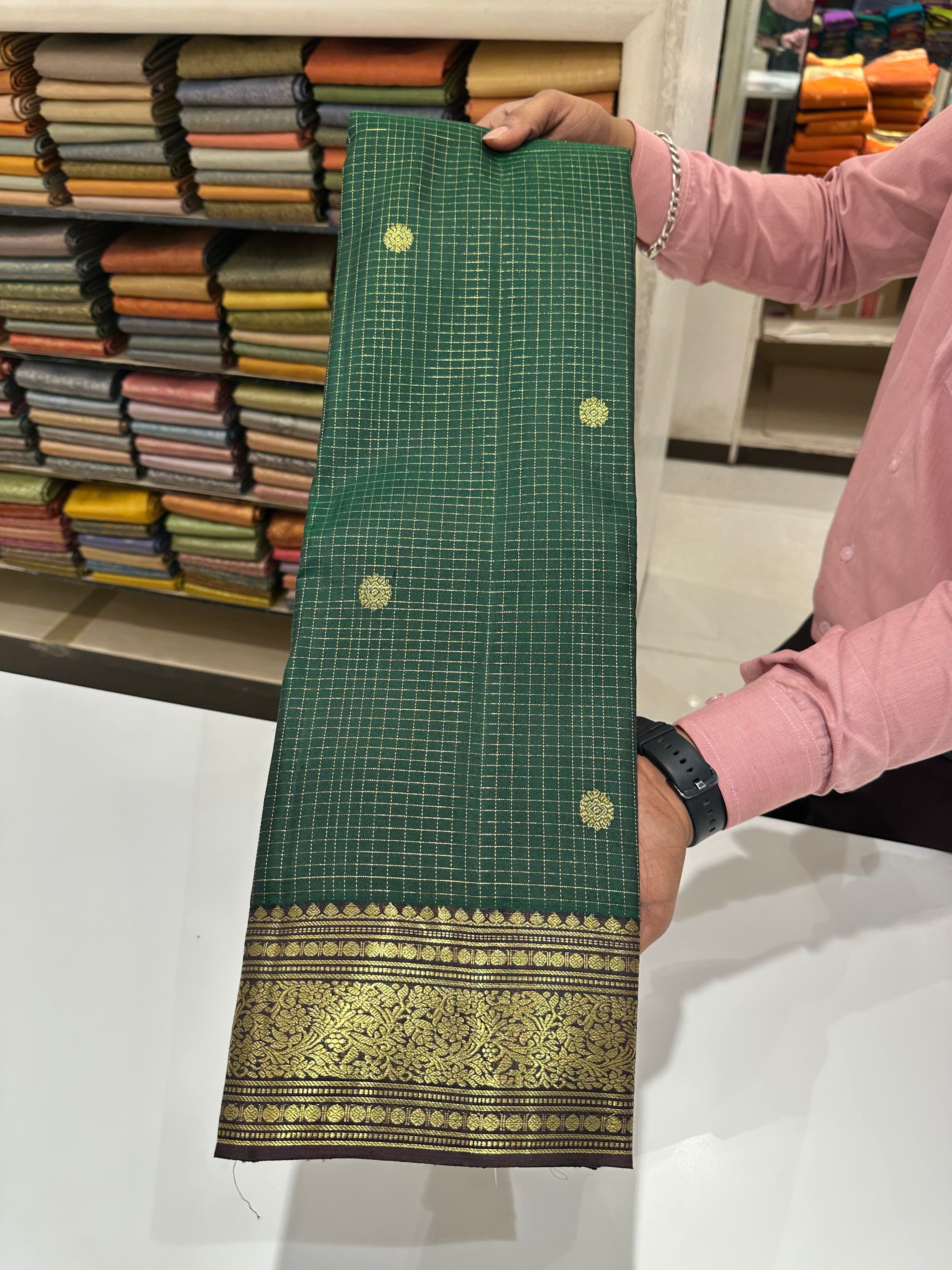 A Grand Zari Butta Kanjivaram Silk wedding saree in Green & Brown