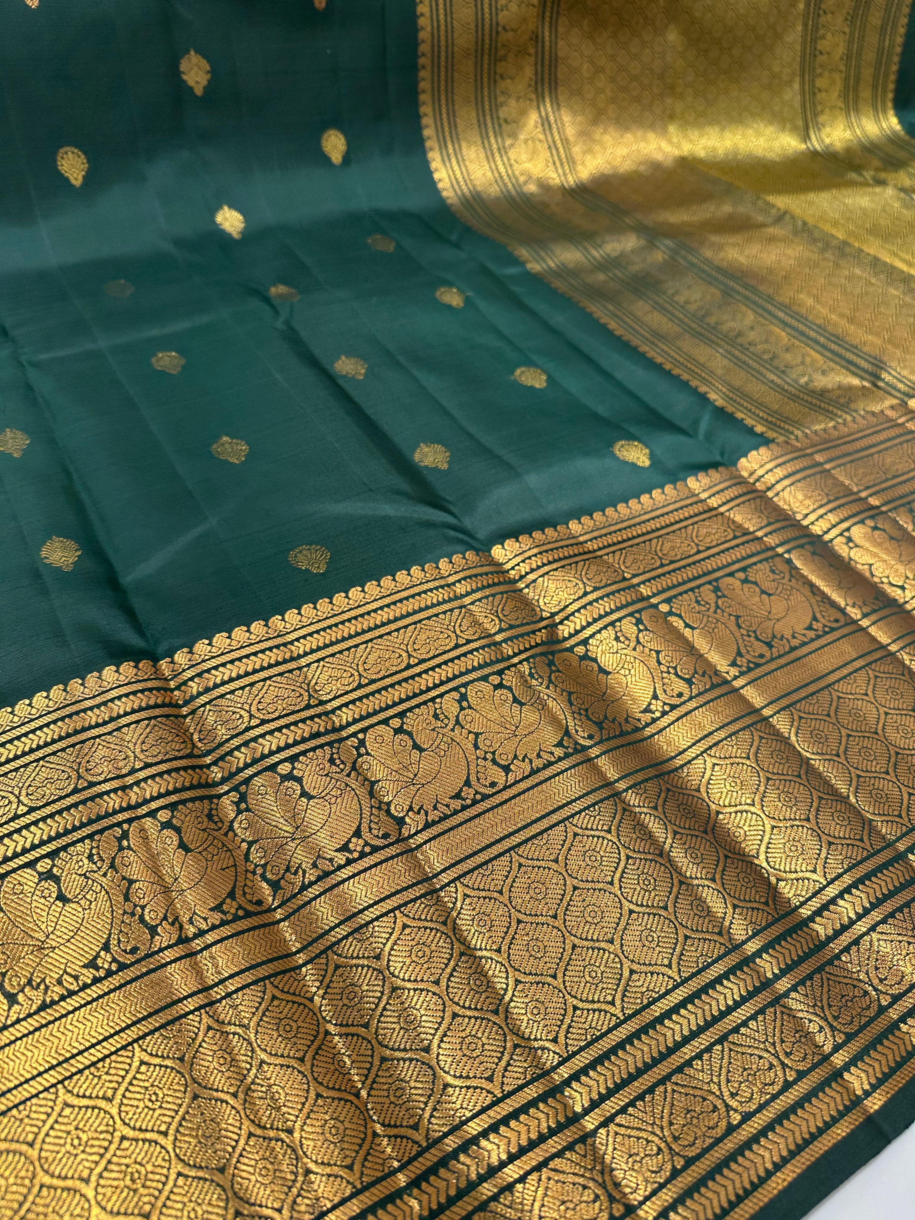 Green color Pure Kanjivaram Silk Saree with Grand Traditional Look