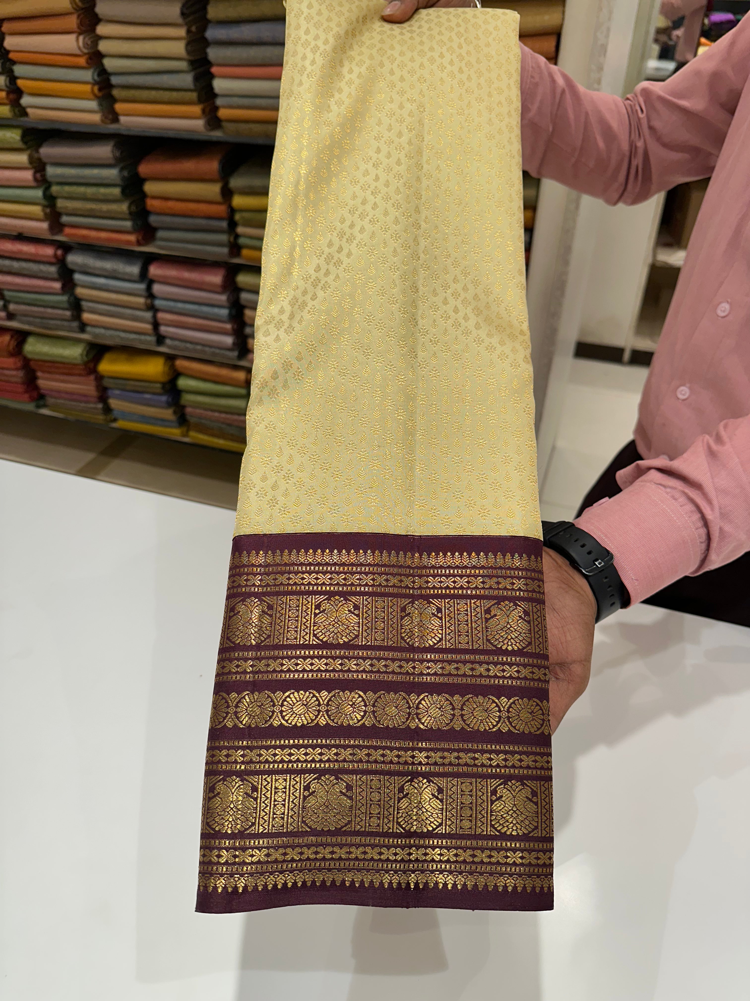 Classic Royal White Saree with Brown Border & Grand Zari Weaving – Leela Verse