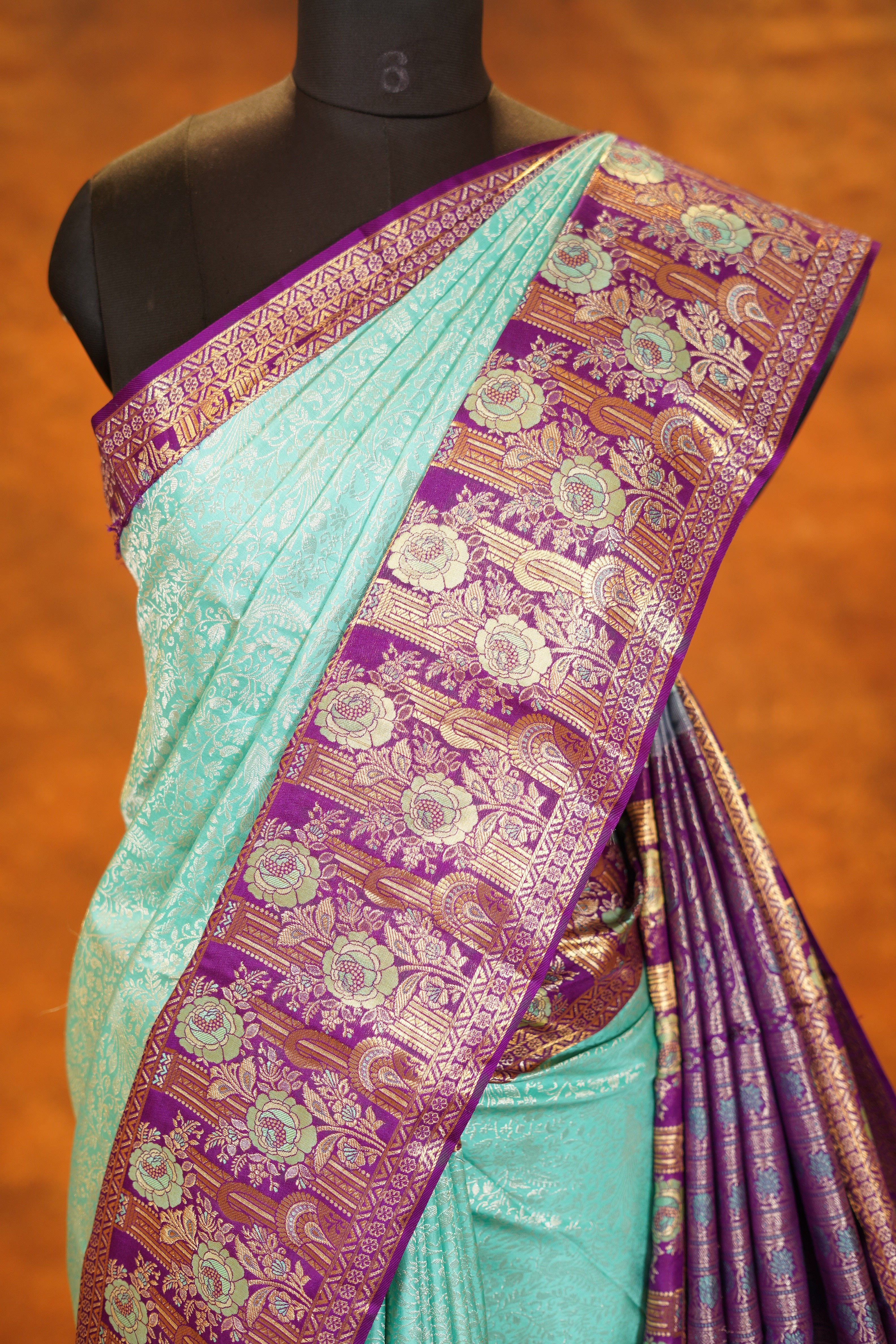 Pastel Green colour Pure Kanjivaram Silk Saree with Purple contrast
