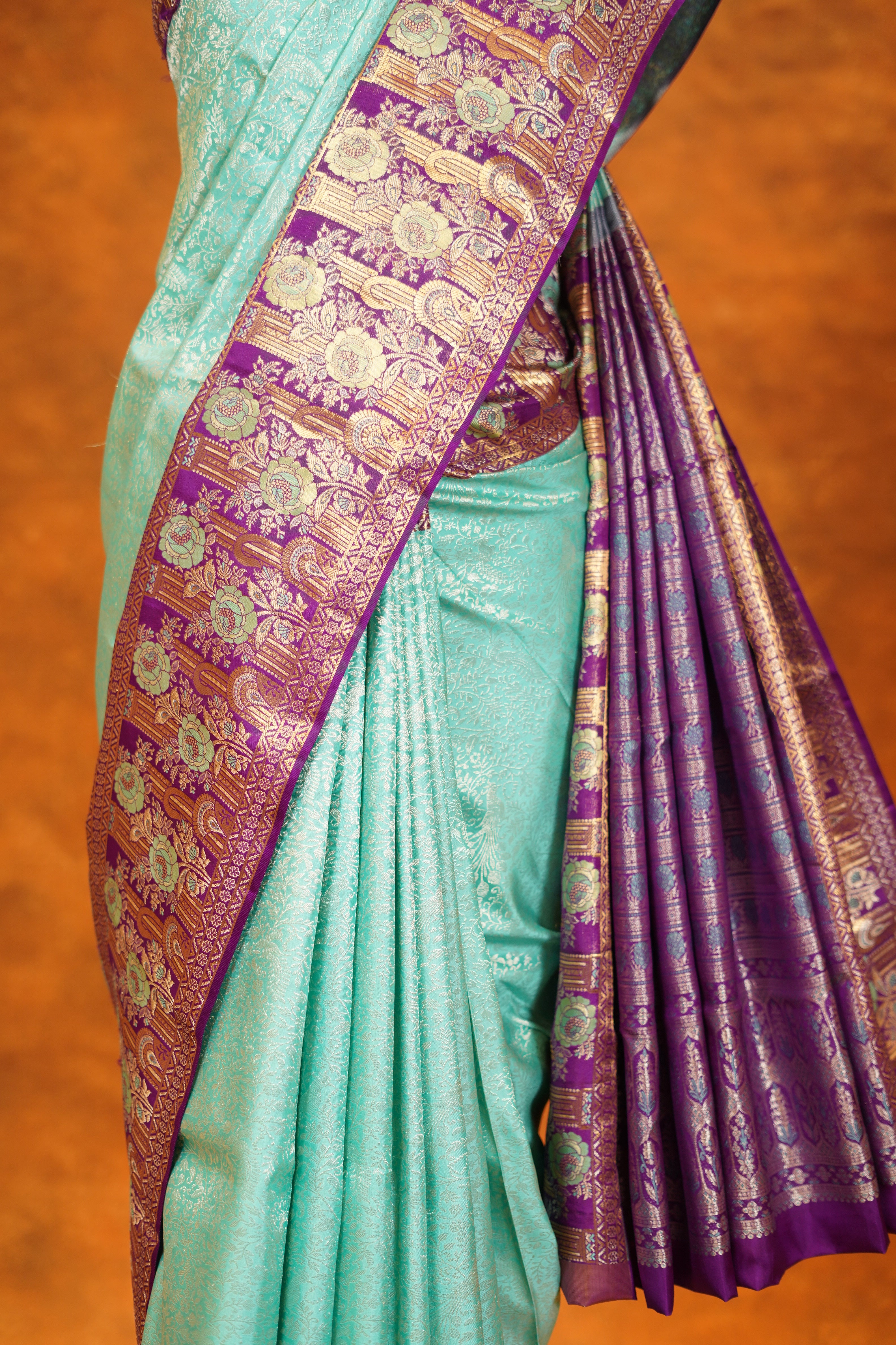 Pastel Green colour Pure Kanjivaram Silk Saree with Purple contrast