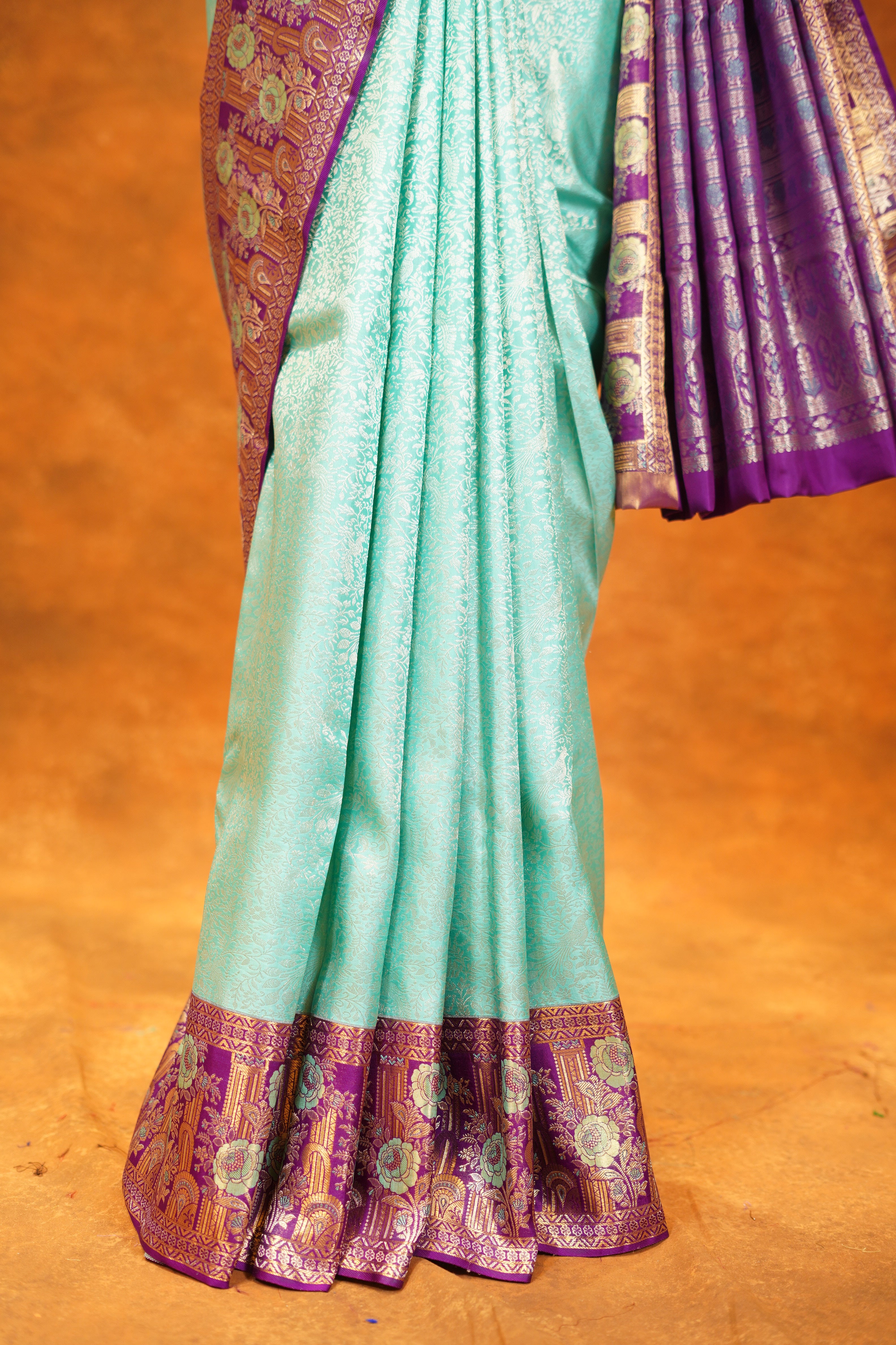 Pastel Green colour Pure Kanjivaram Silk Saree with Purple contrast