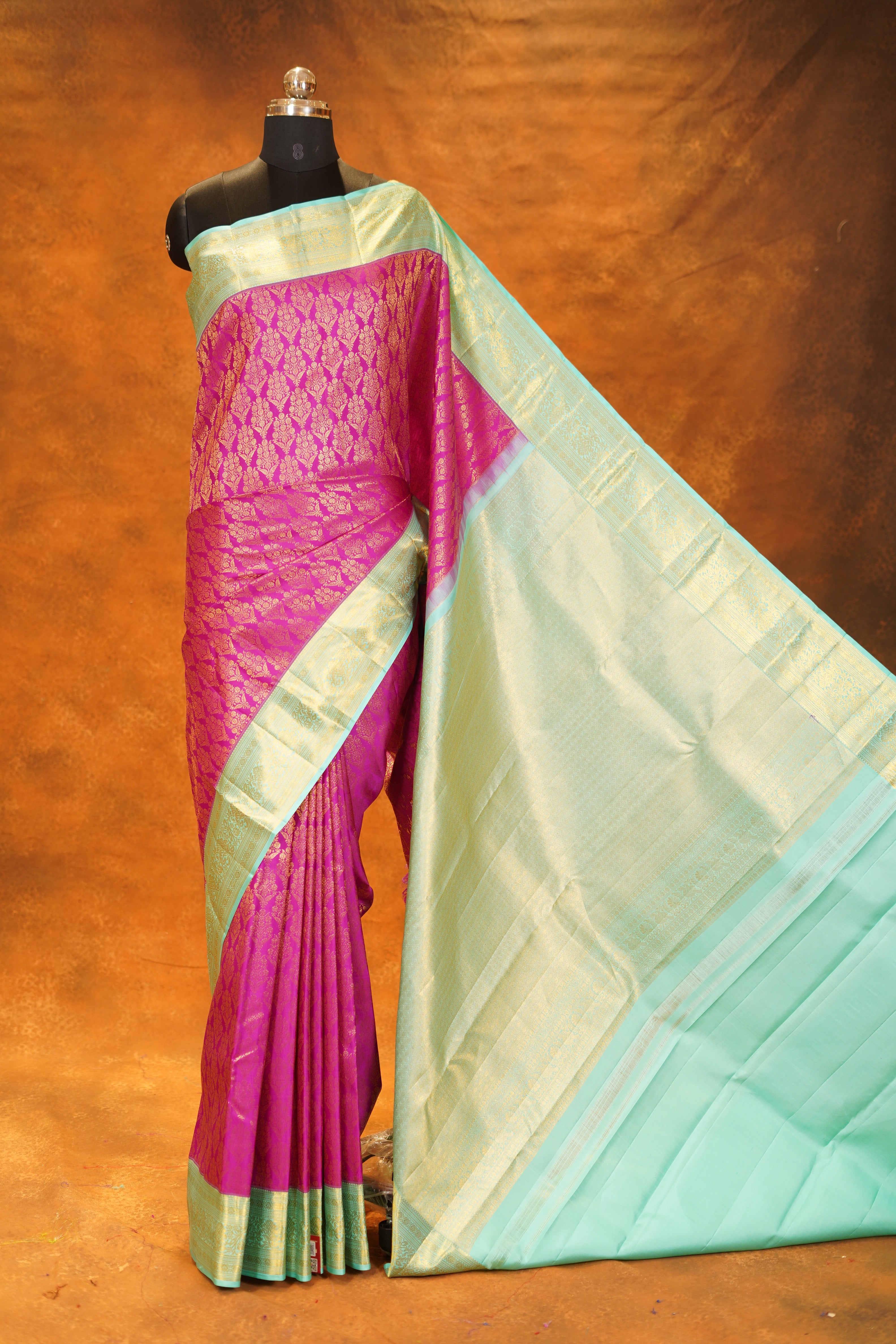 Magenta Pink colour Pure Kanjivaram Silk Saree with Mint Green Contrast