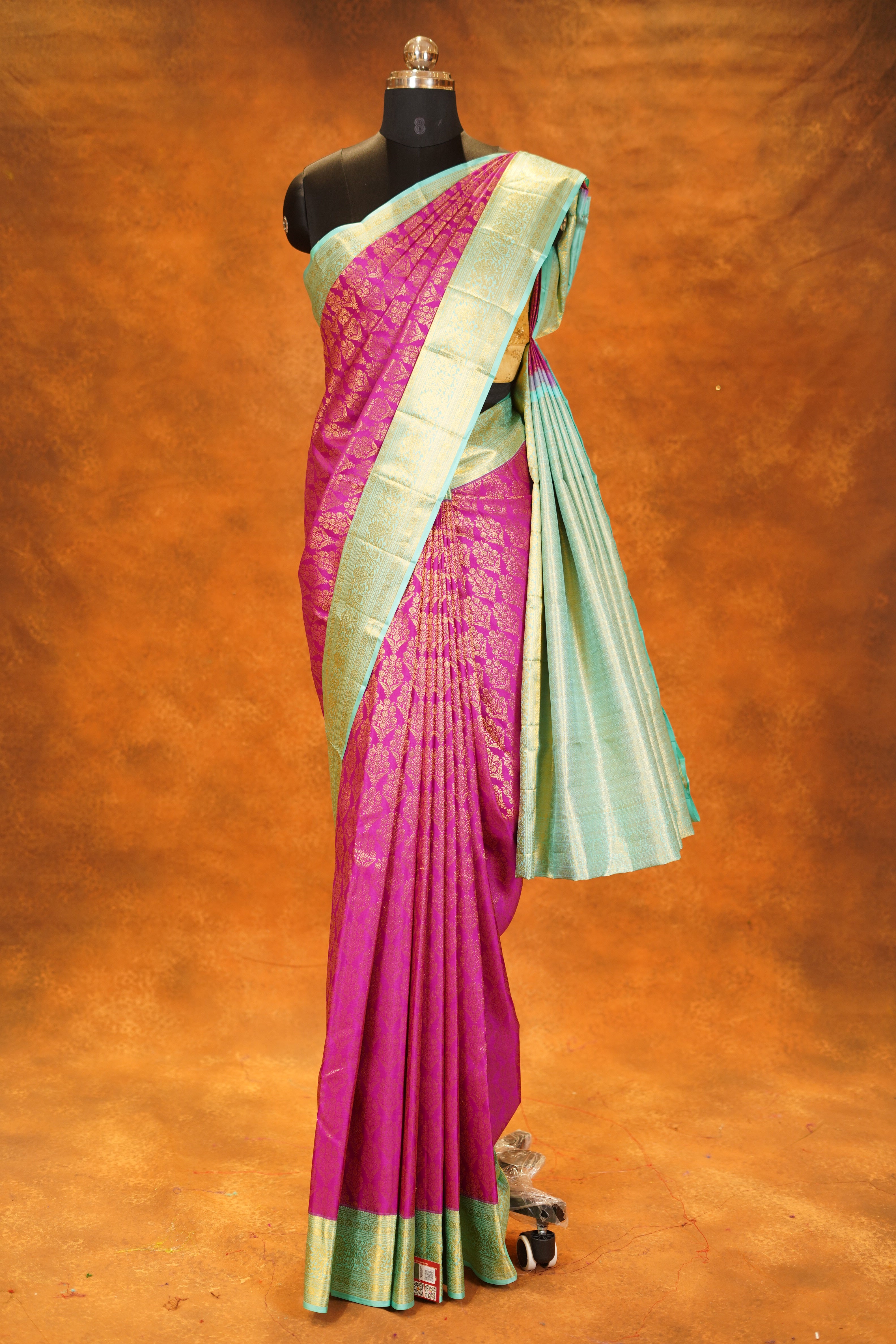 Magenta Pink colour Pure Kanjivaram Silk Saree with Mint Green Contrast