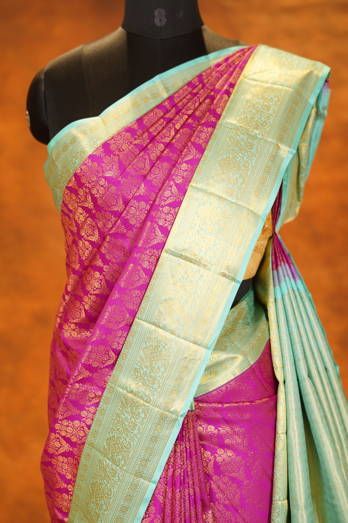 Magenta Pink colour Pure Kanjivaram Silk Saree with Mint Green Contrast