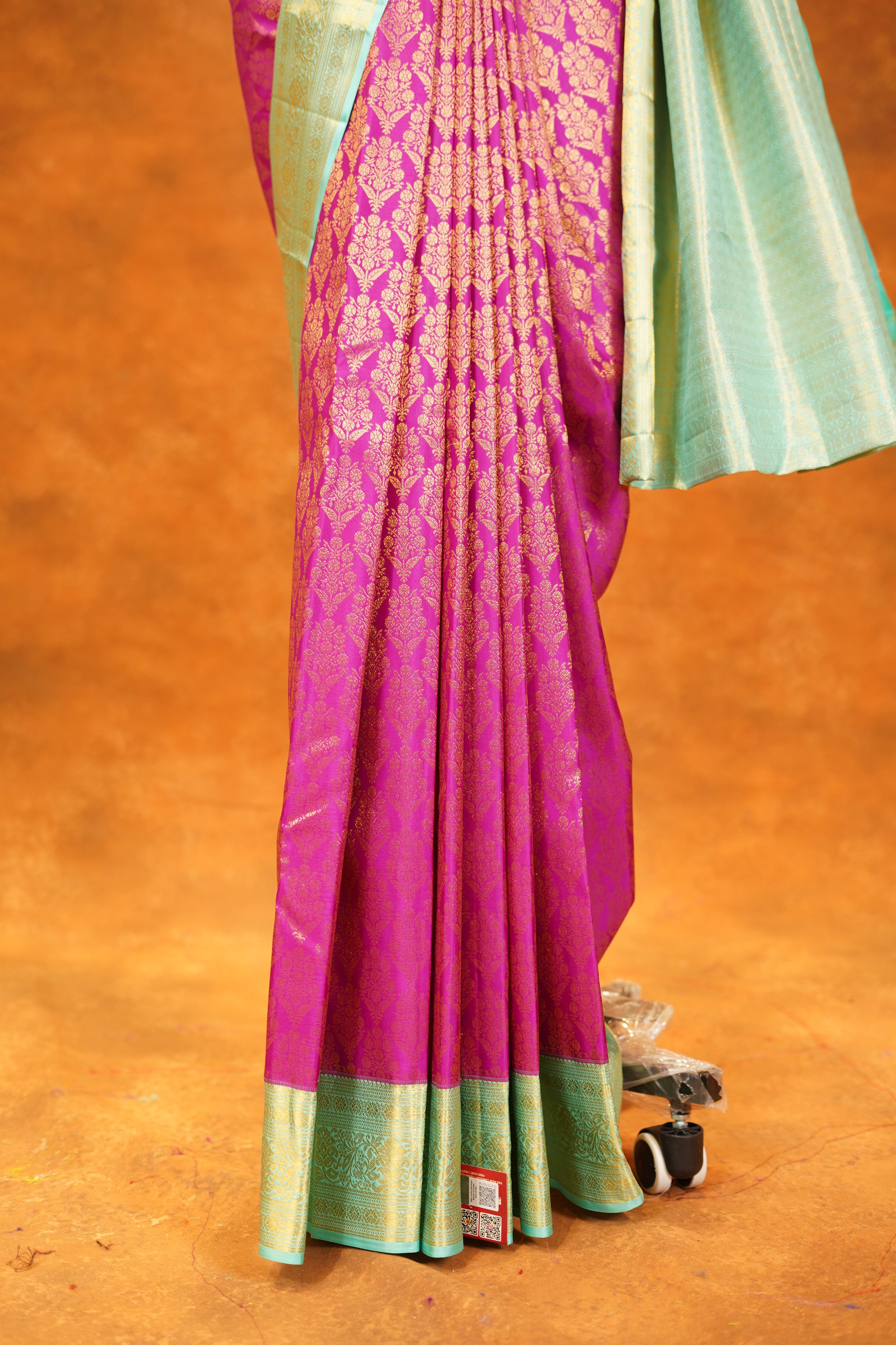 Magenta Pink colour Pure Kanjivaram Silk Saree with Mint Green Contrast