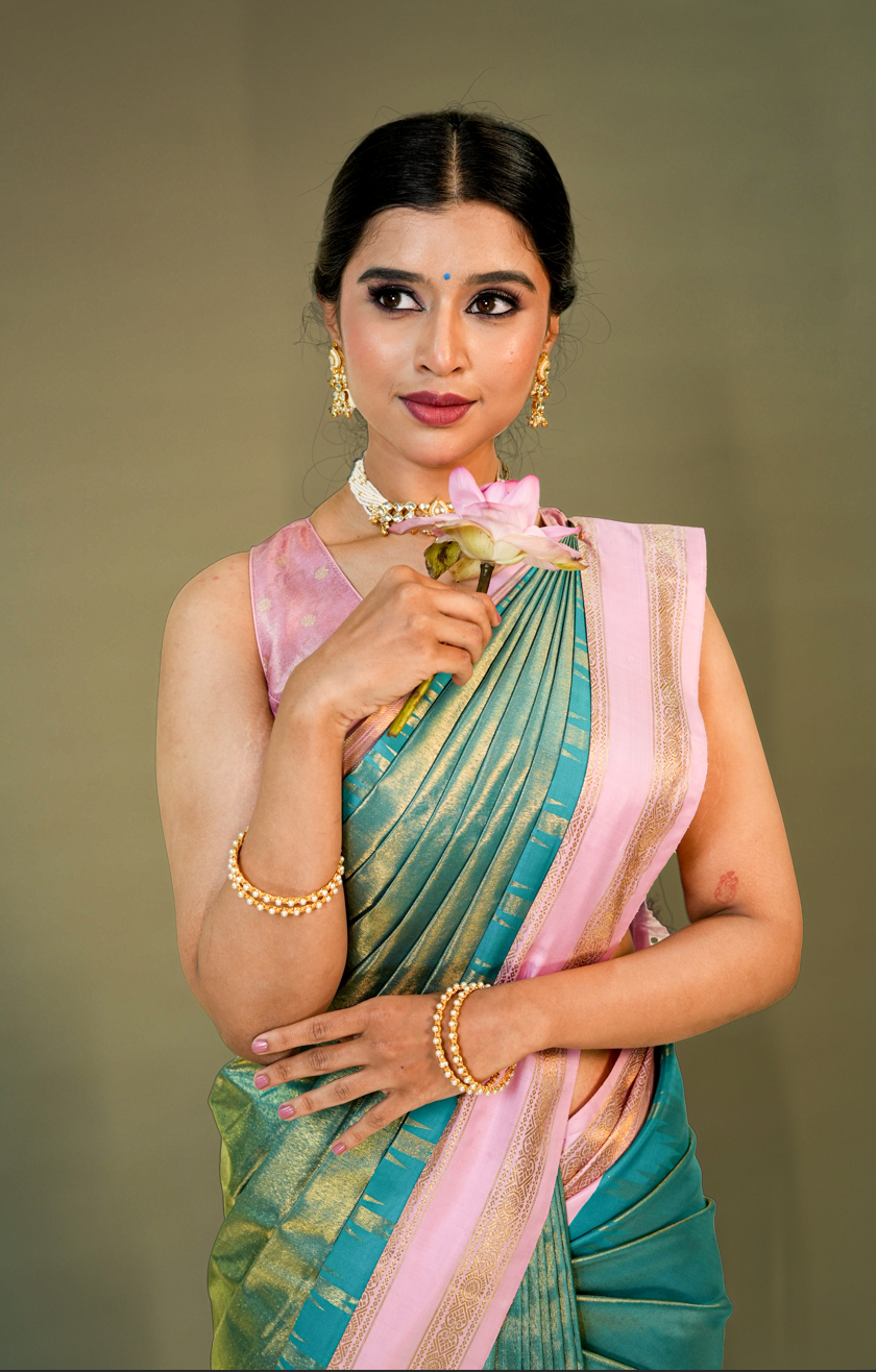 Green Kanjivaram Silk Saree with Contrast Pink Border and Rich Golden Zari Work – Wedding Special