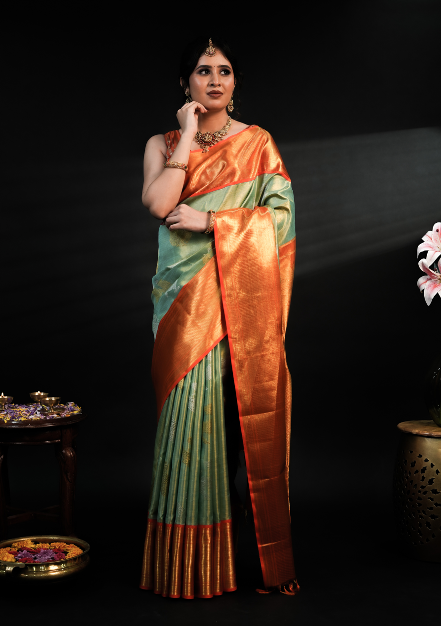 Pista Green Kanjivaram Silk Saree with Rich Orange Border and Dual Tone Yali Zari Design